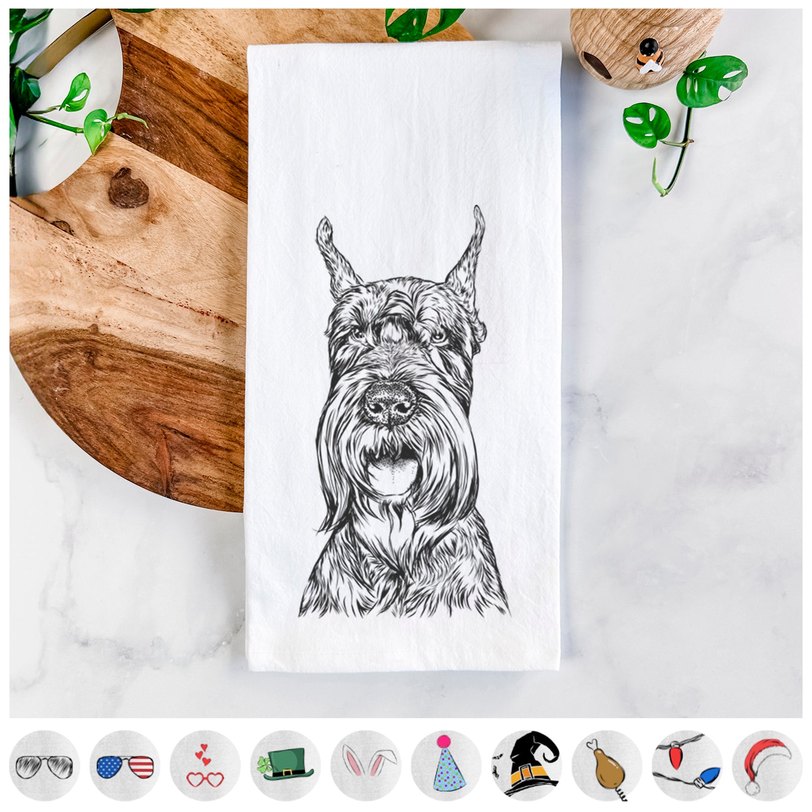Hand-drawn sketch of Zuri the Giant Schnauzer on a tea towel, shown with icons of the other available costume styles