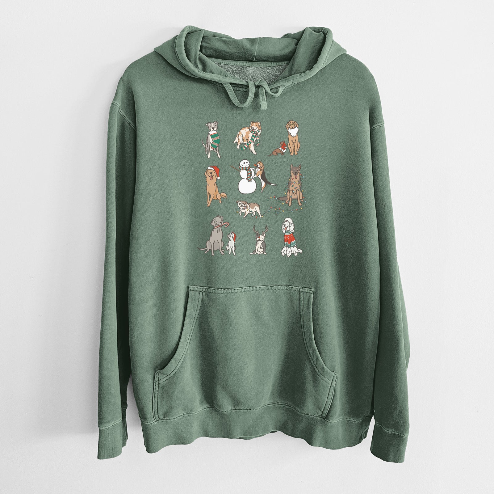 'Christmas Pups' design on an Alpine Green Unisex pigment dyed hoodie