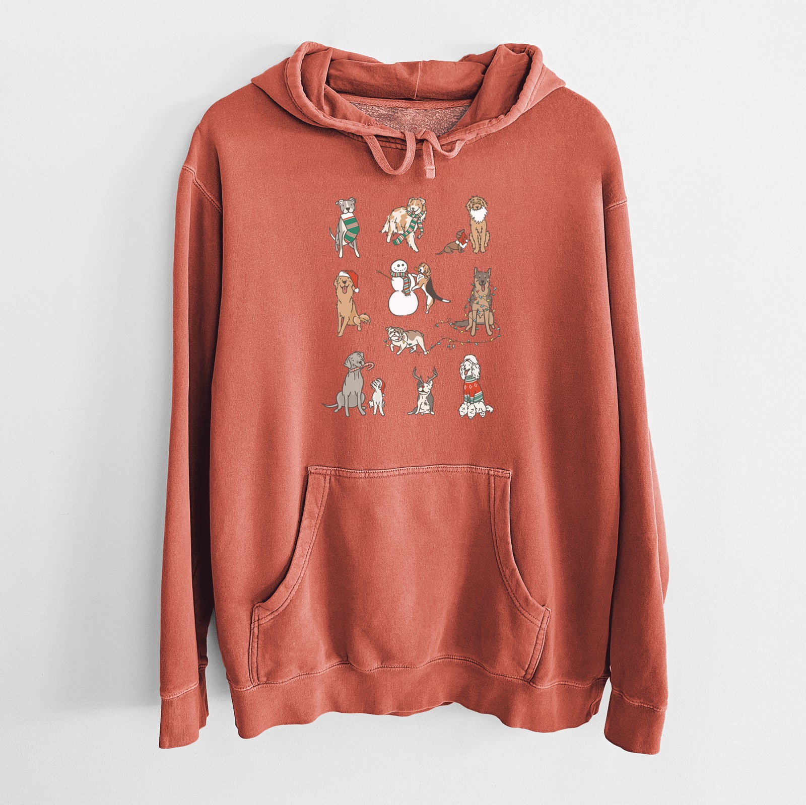 'Christmas Pups' design on an Amber Unisex pigment dyed hoodie