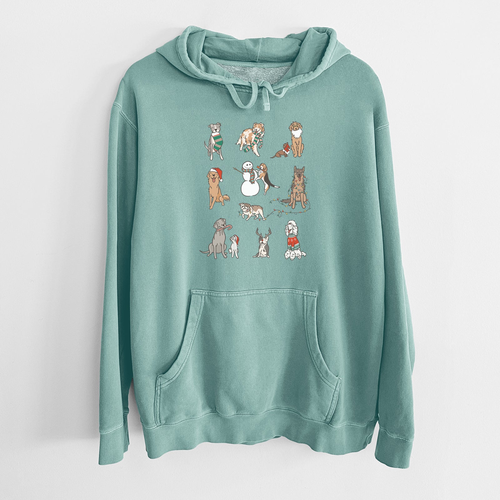 'Christmas Pups' design on a Mint Unisex pigment dyed hoodie