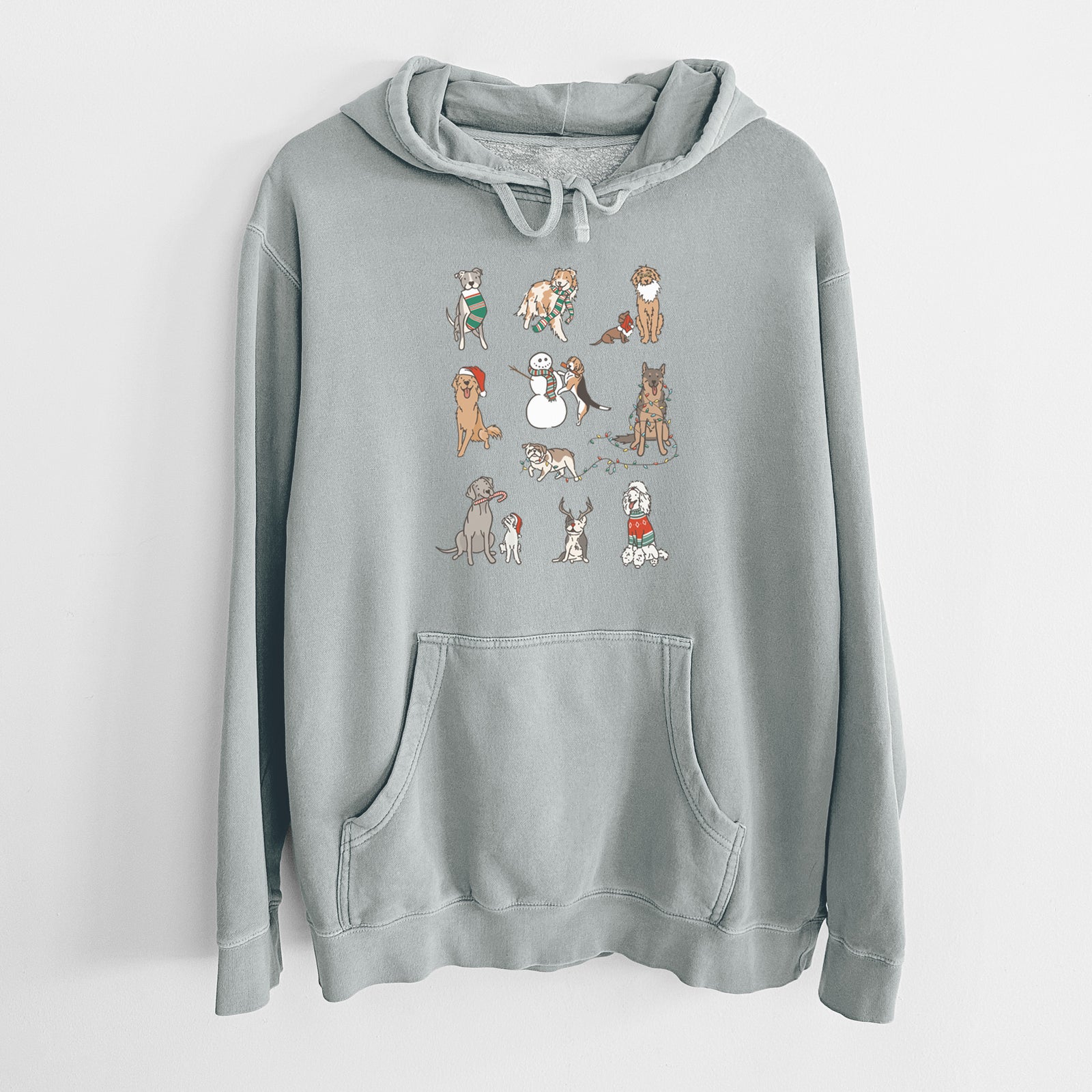'Christmas Pups' design on a Sage Unisex pigment dyed hoodie