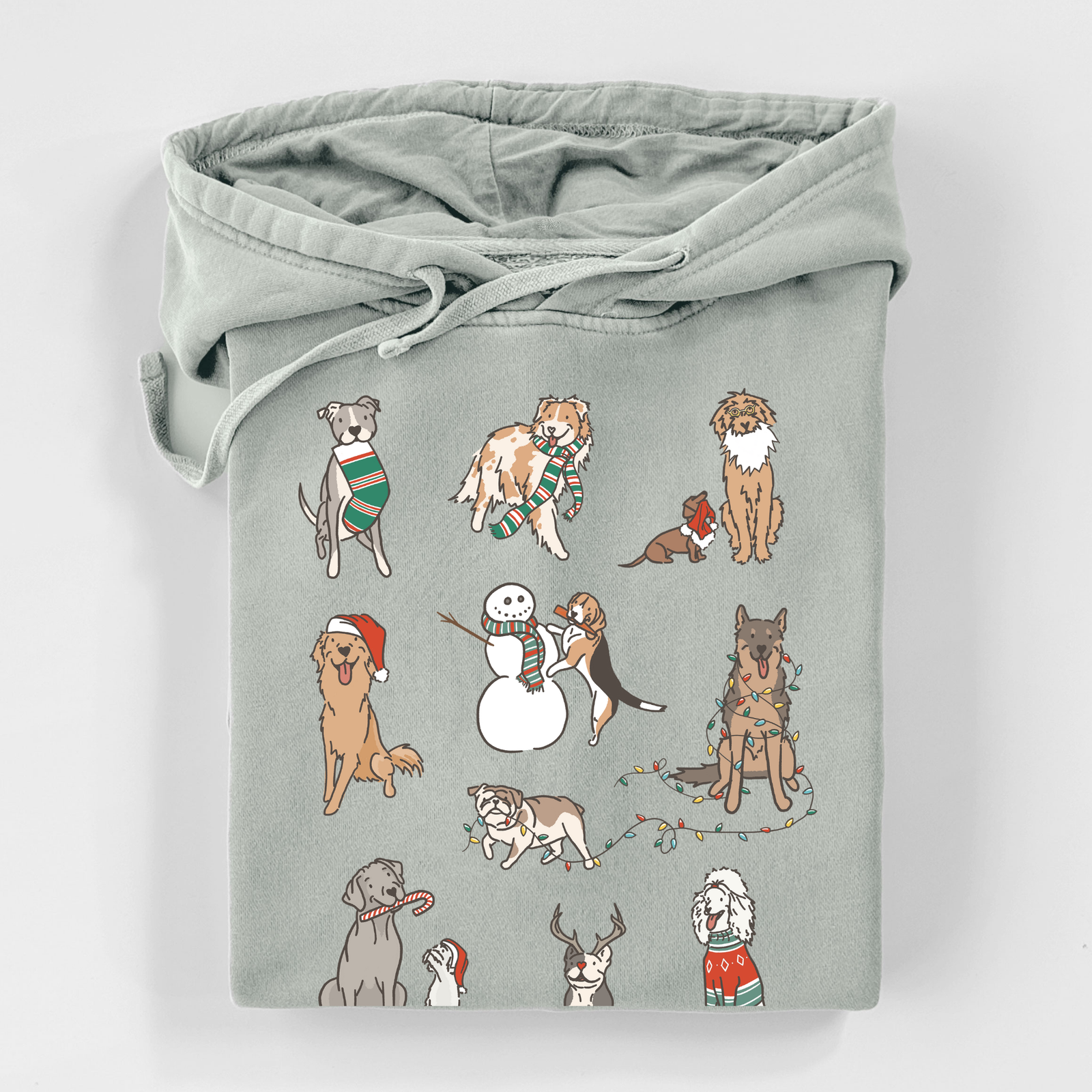 'Christmas Pups' design on an Unisex pigment dyed hoodie