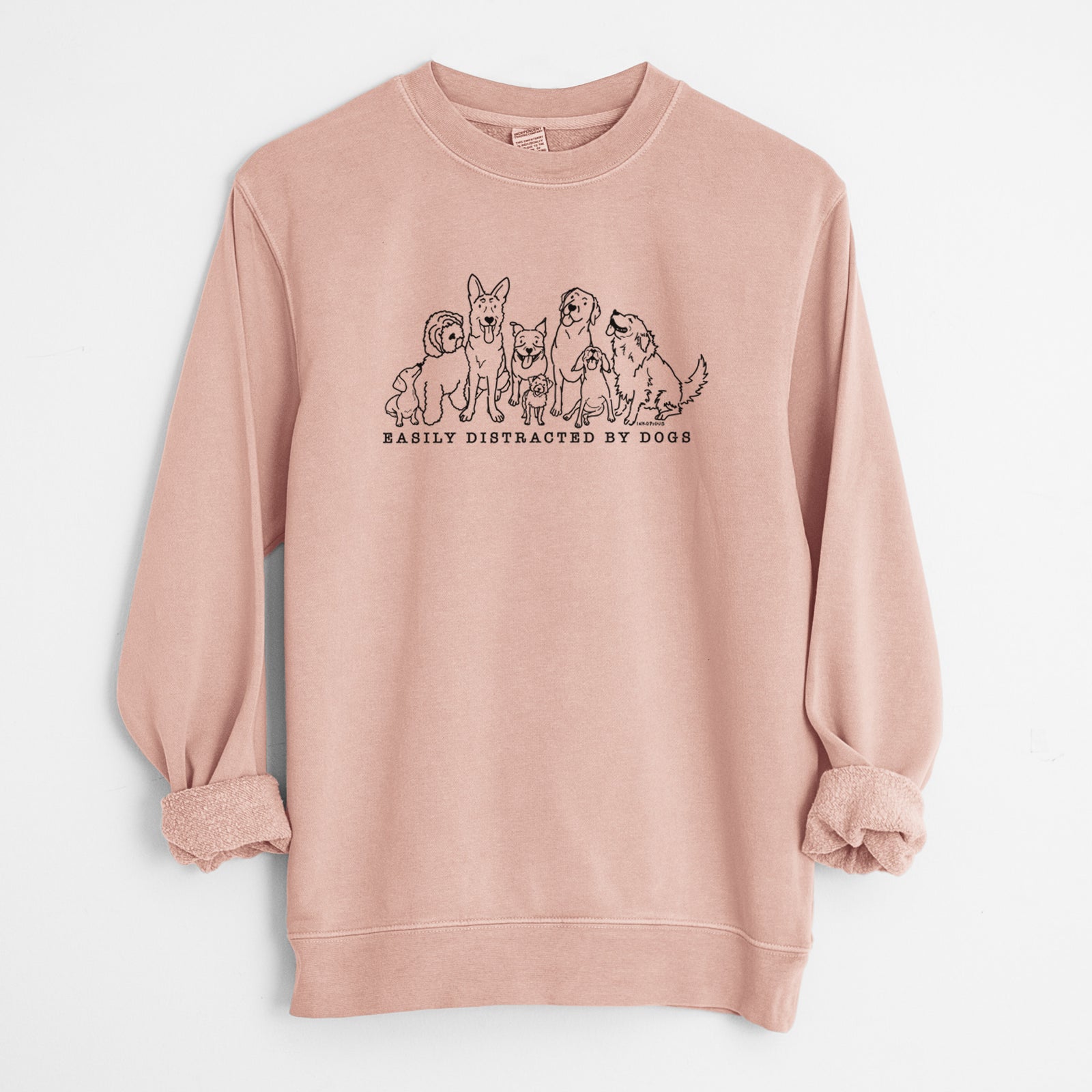 'Distracted by Dogs' design on a Dusty Pink Unisex pigment dyed crew sweatshirt
