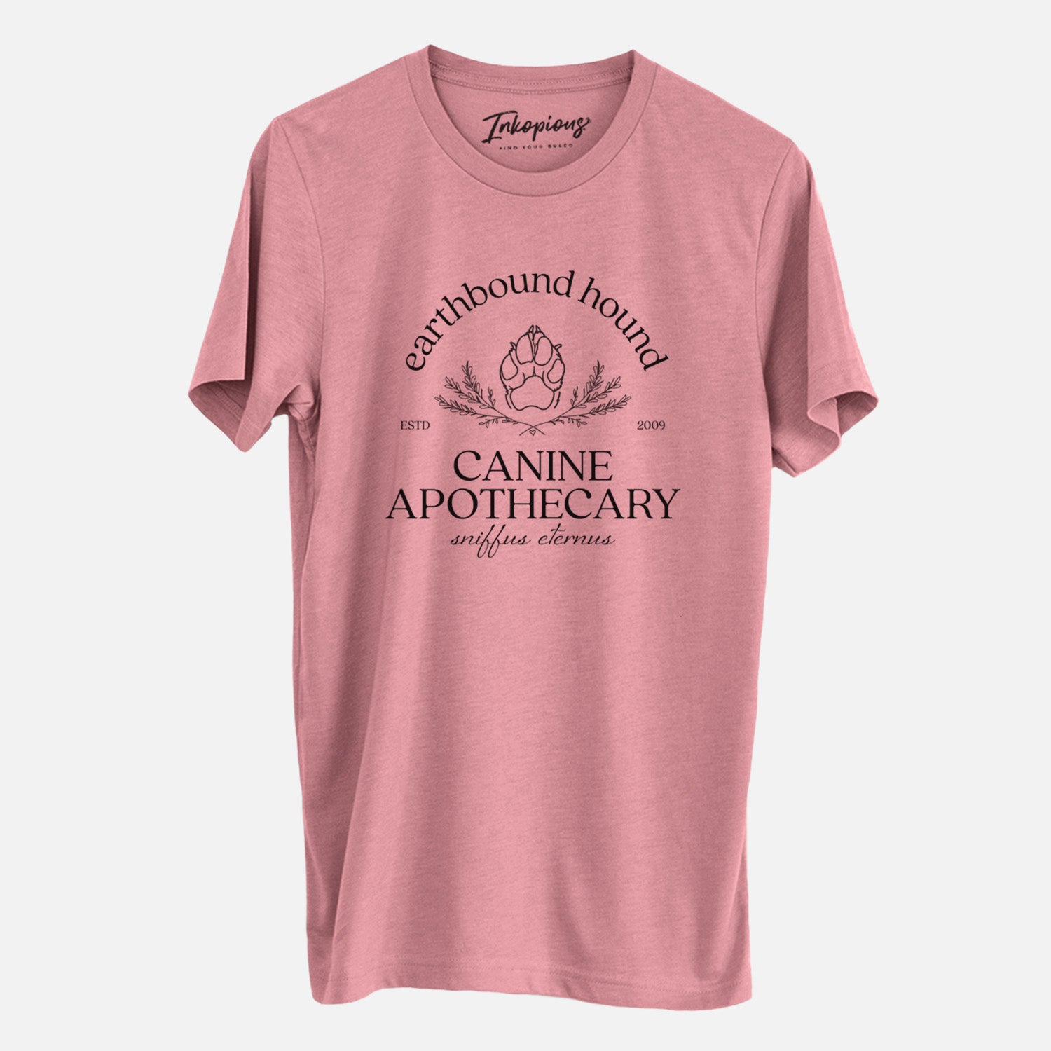 'Earthbound Hound – Canine Apothecary' design on a Mauve Unisex crewneck, worn by a man