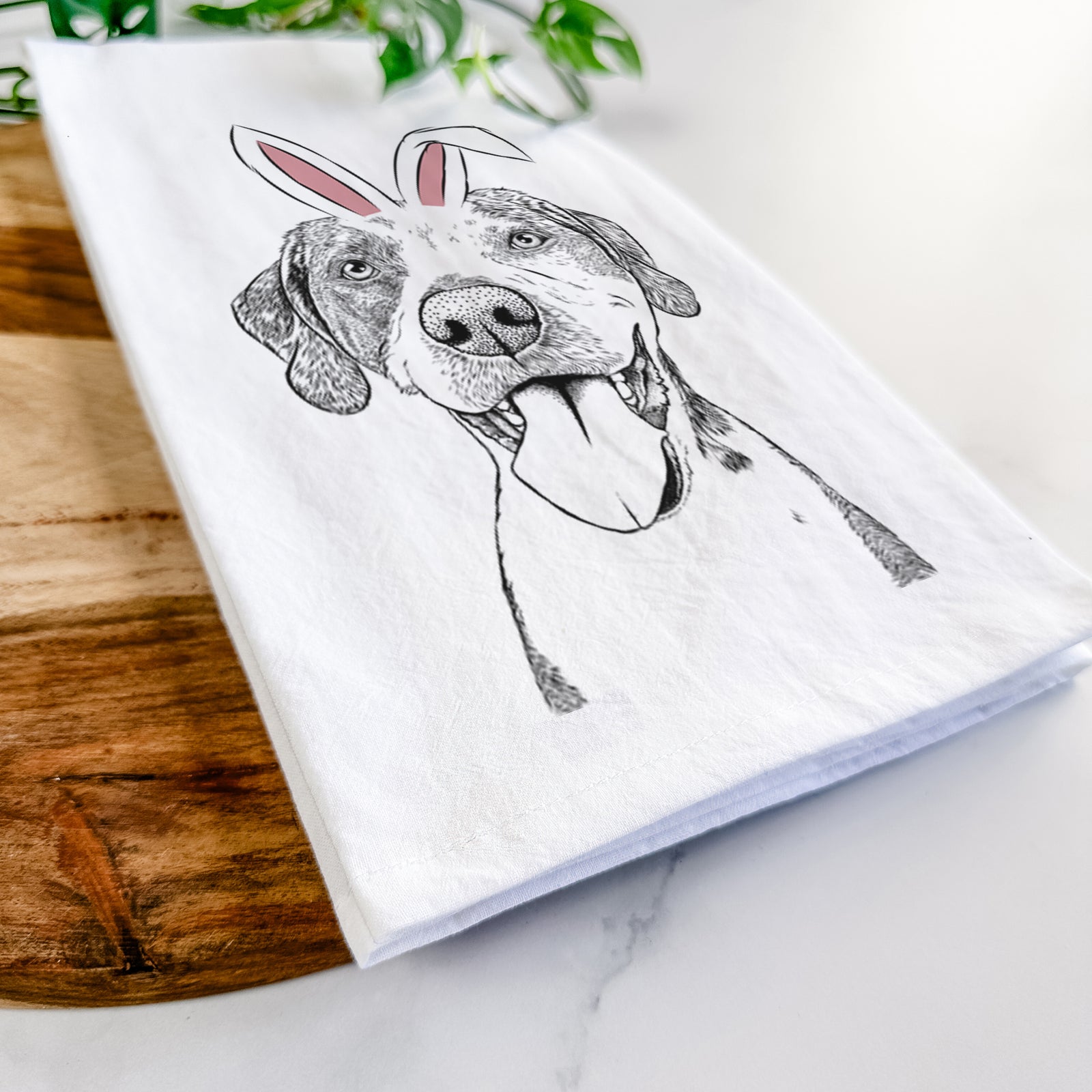 Hand-drawn sketch of Ace Boogie the Mixed Breed wearing Easter bunny ears on a tea towel