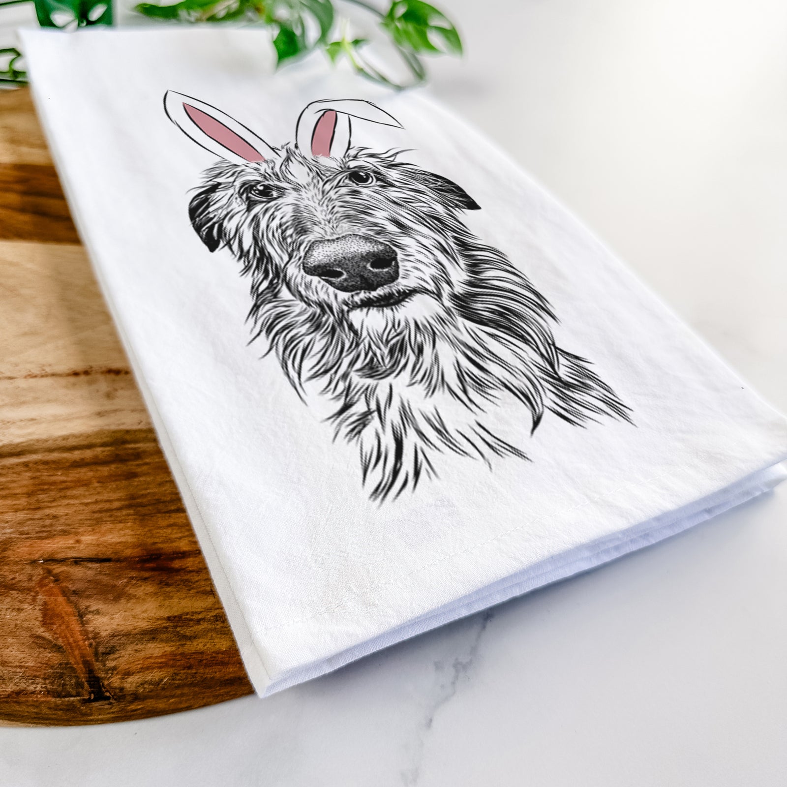 Hand-drawn sketch of Cleod the Scottish Deerhound wearing Easter bunny ears on a tea towel