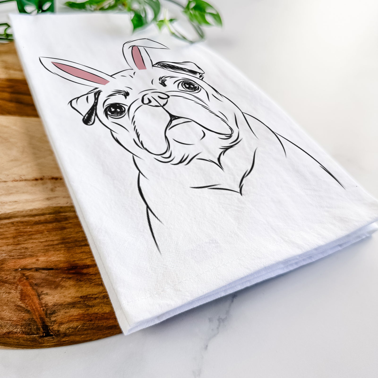 Hand-drawn sketch of Darling Chloe the Pug wearing Easter bunny ears on a tea towel