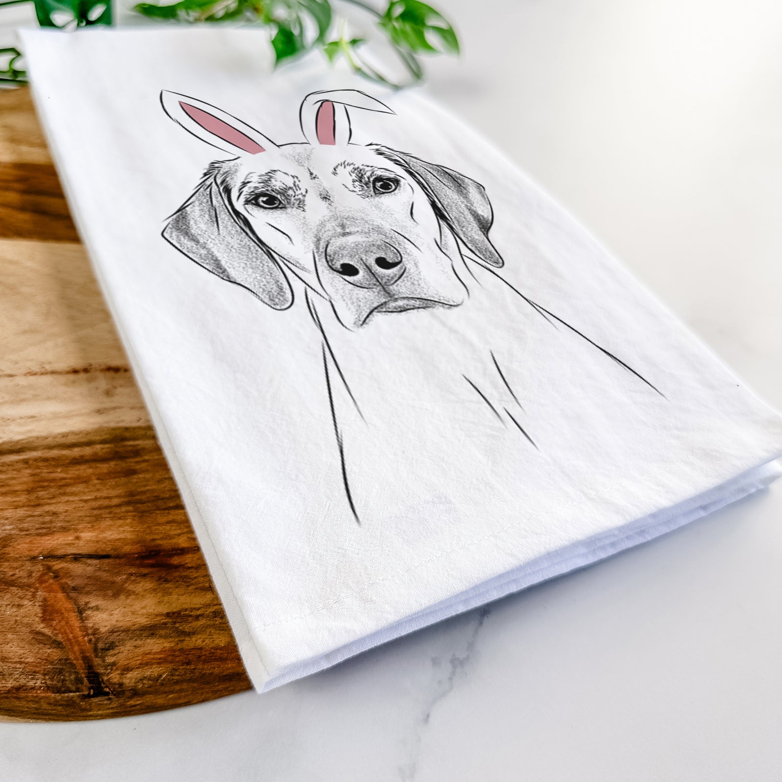 Hand-drawn sketch of Jenga the Rhodesian Ridgeback wearing Easter bunny ears on a tea towel