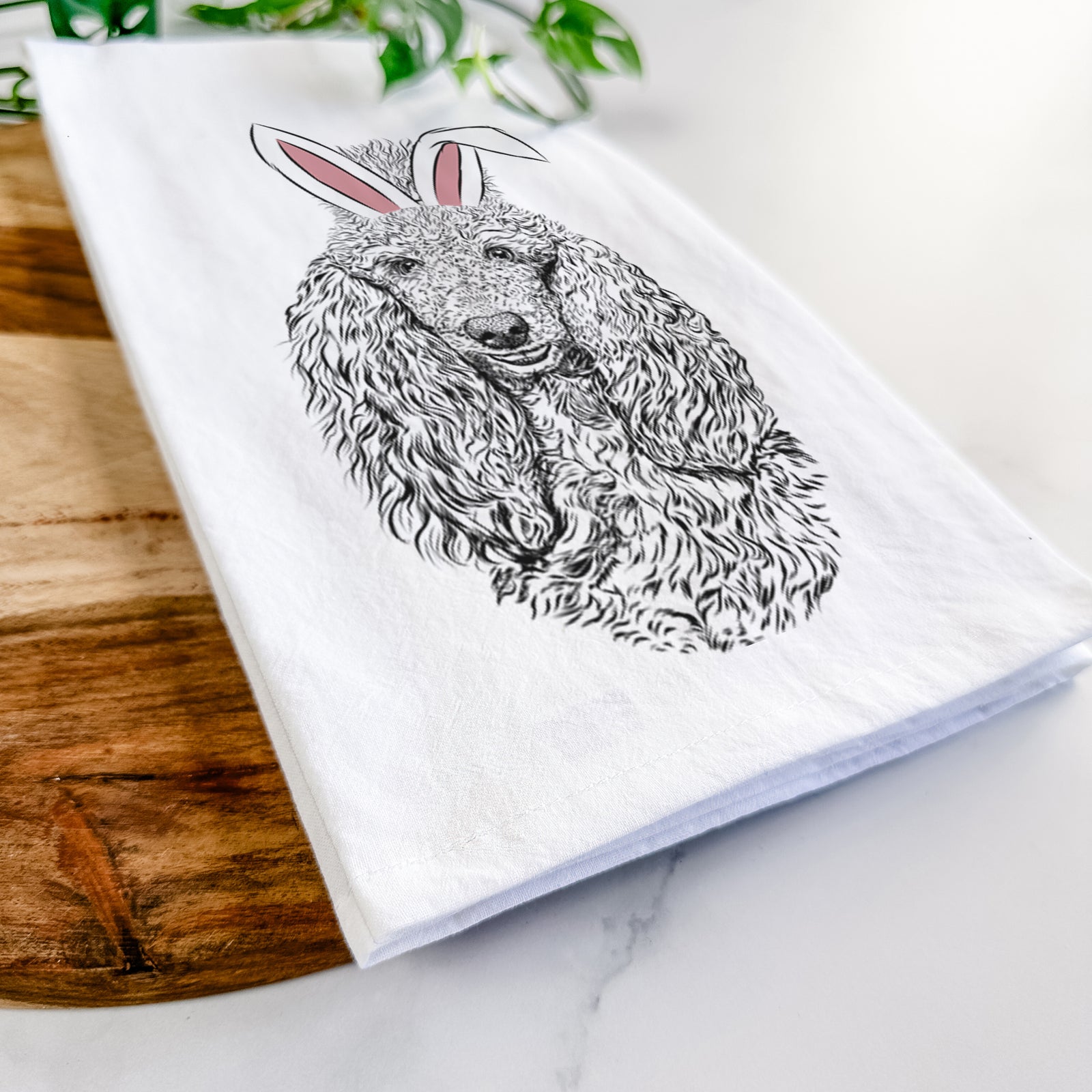 Hand-drawn sketch of Kenna the Standard Poodle wearing Easter bunny ears on a tea towel