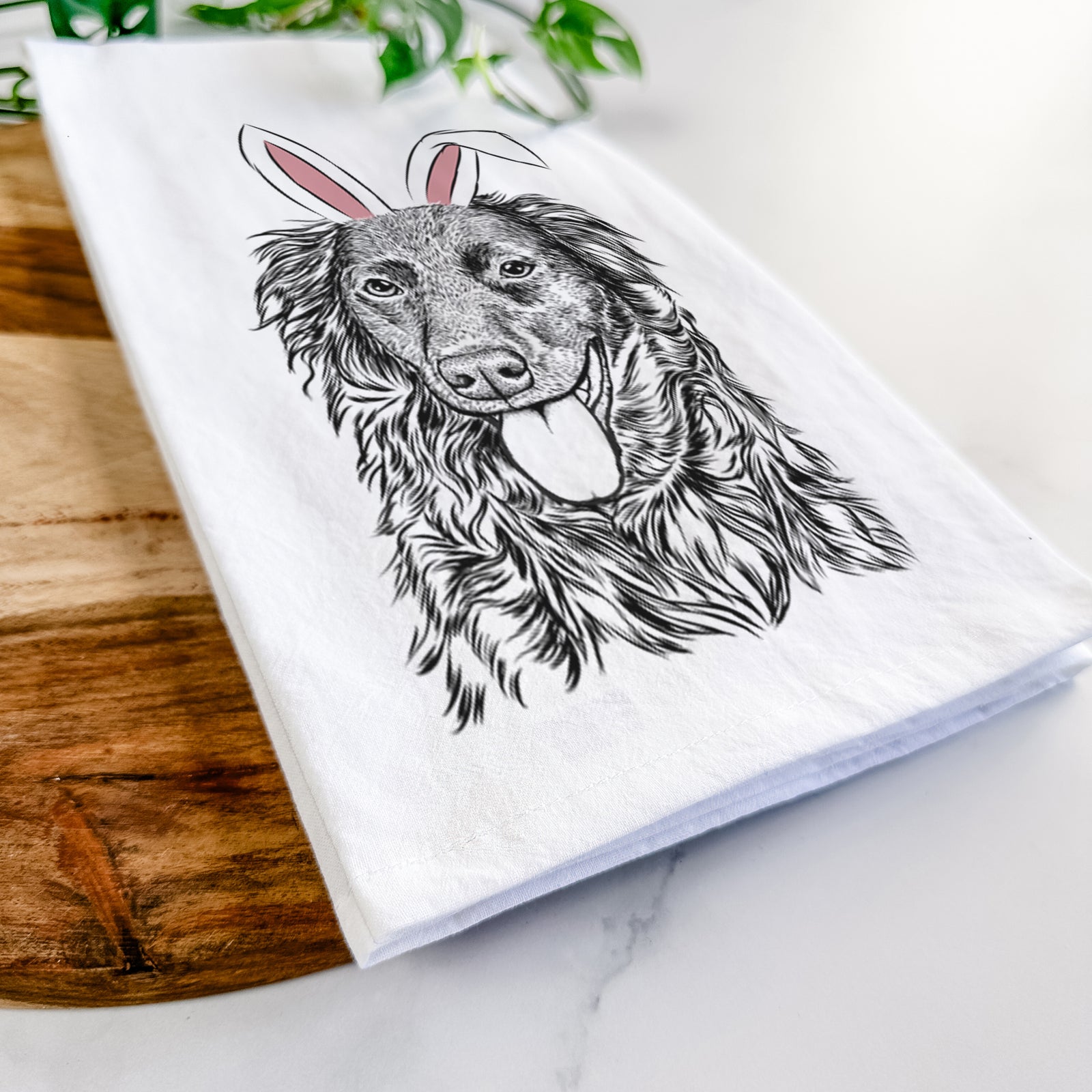 Hand-drawn sketch of Maisie Mae the Aussiedor wearing Easter bunny ears on a tea towel