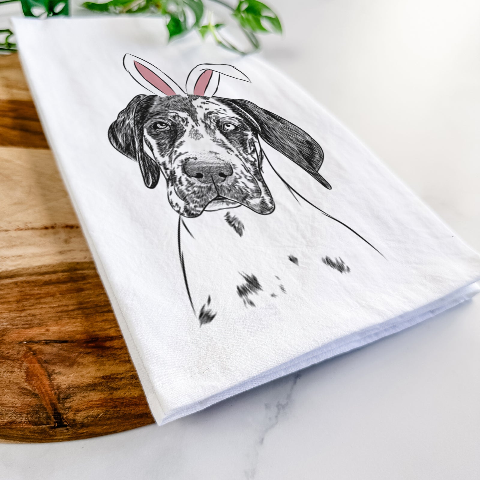 Hand-drawn sketch of Nyx the Great Dane wearing Easter bunny ears on a tea towel