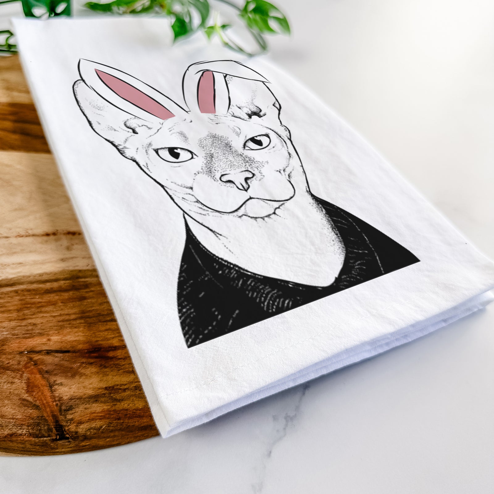 Hand-drawn sketch of Oliver Watson the Sphynx Cat wearing Easter bunny ears on a tea towel