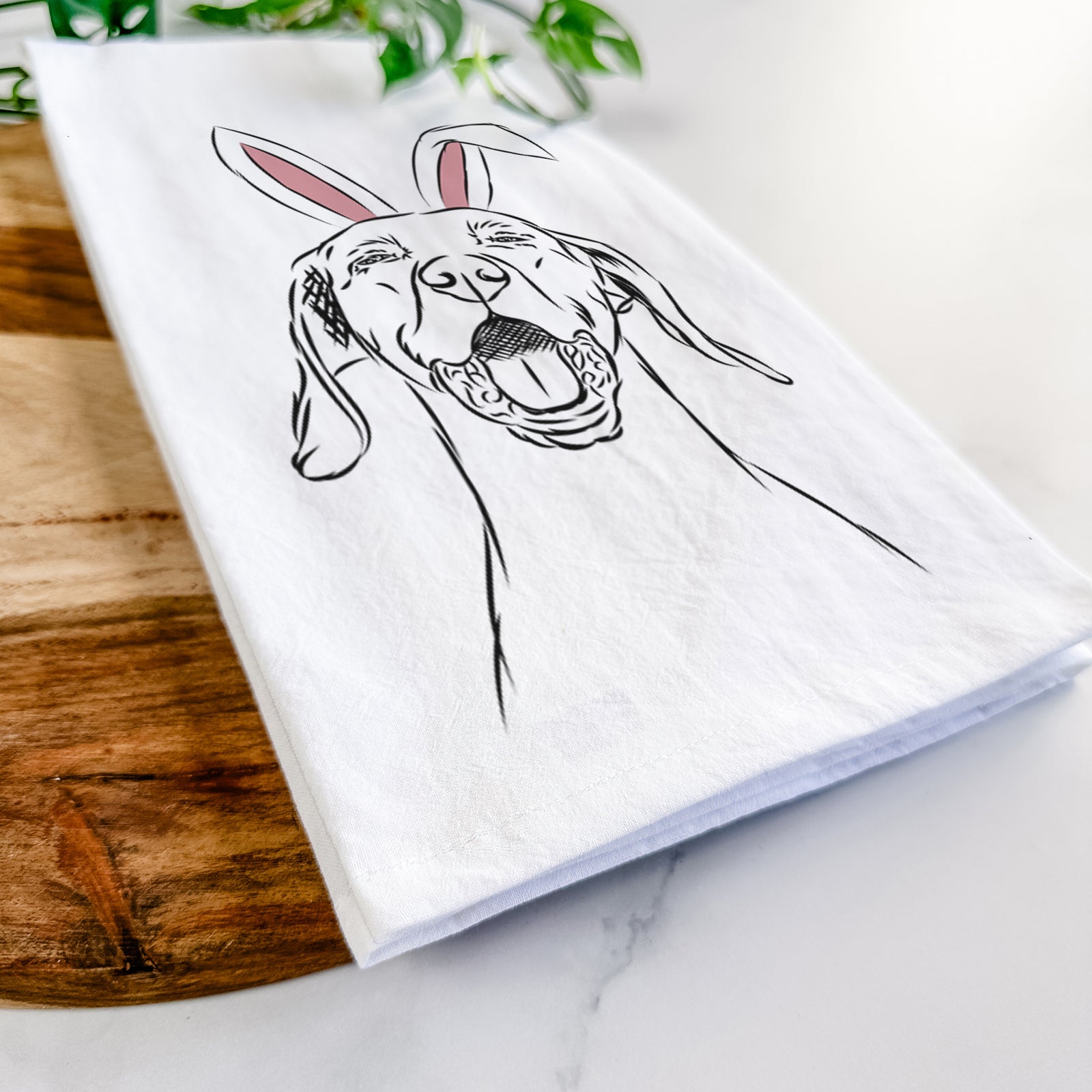 Hand-drawn sketch of Ollie the Vizsla wearing Easter bunny ears on a tea towel