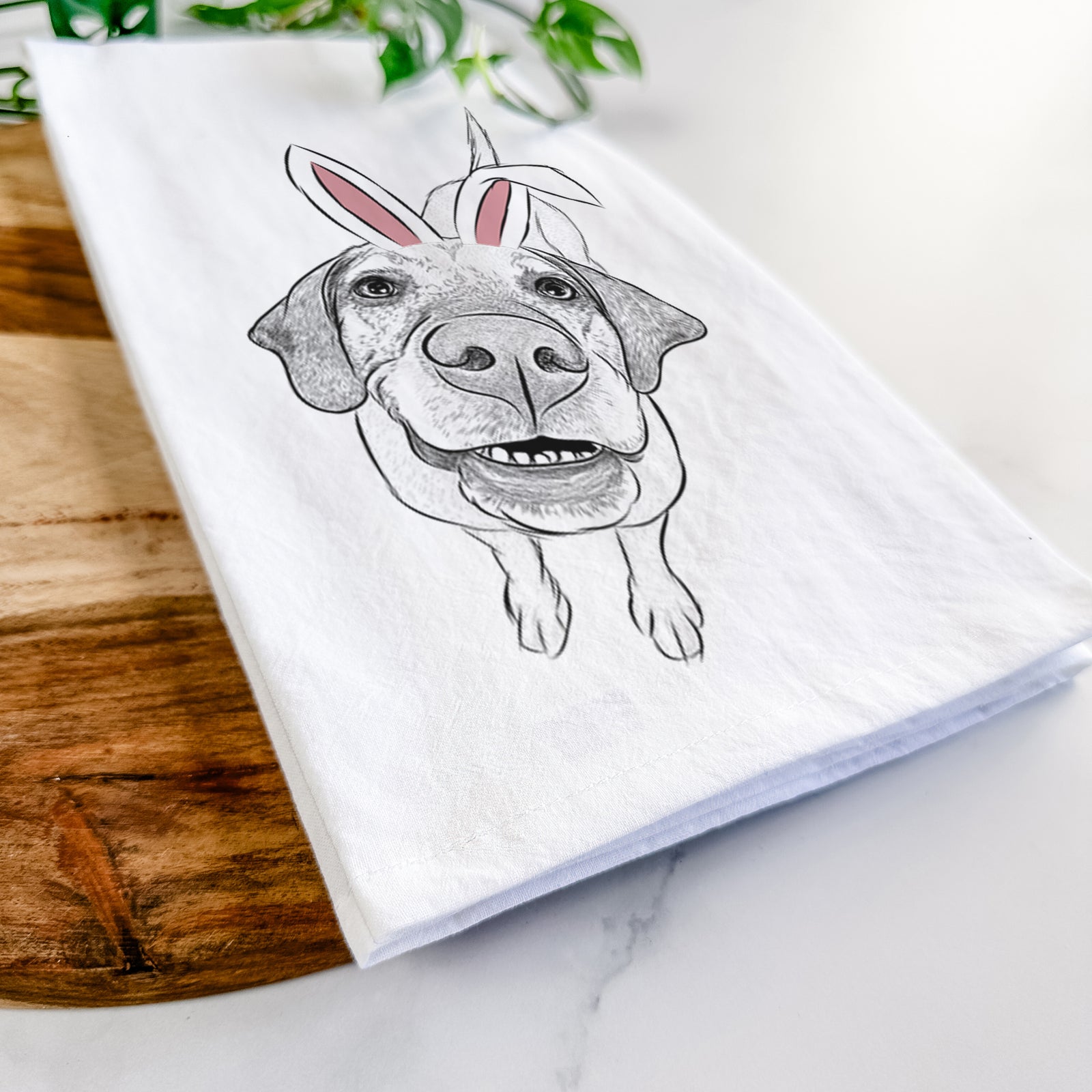 Hand-drawn sketch of Oquirrh the Vizsla wearing Easter bunny ears on a tea towel