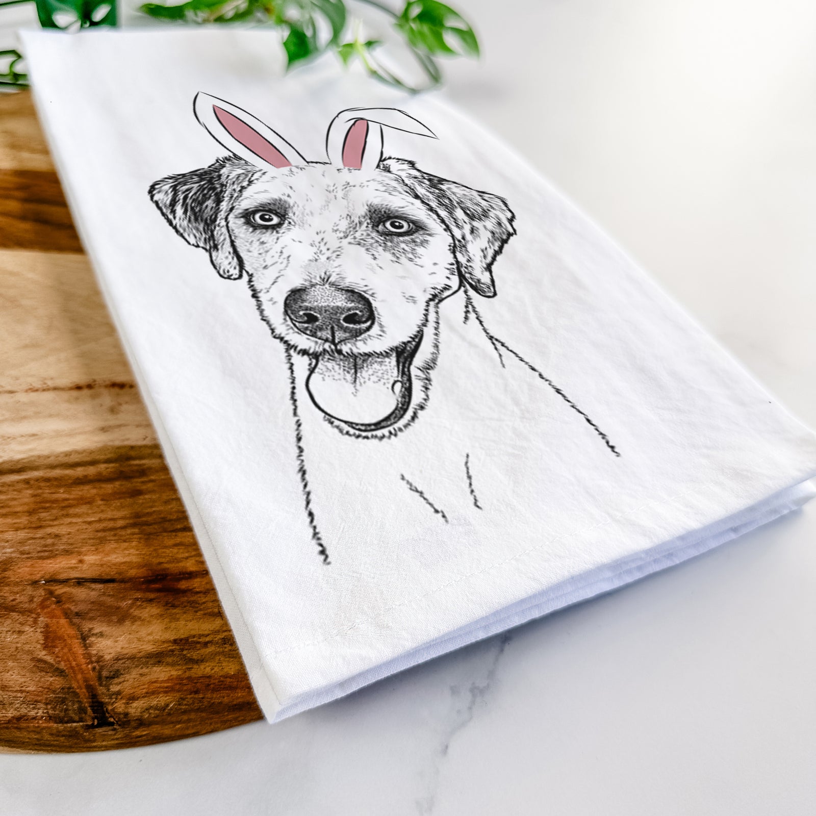 Hand-drawn sketch of Palm Palm the Aussiedoodle wearing Easter bunny ears on a tea towel