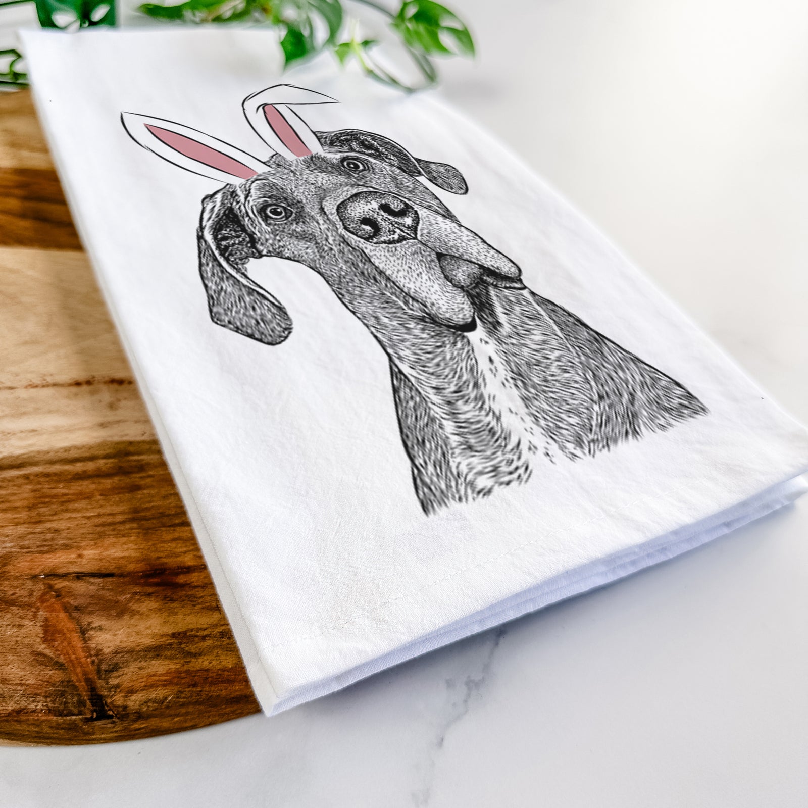 Hand-drawn sketch of River the Great Dane wearing Easter bunny ears on a tea towel