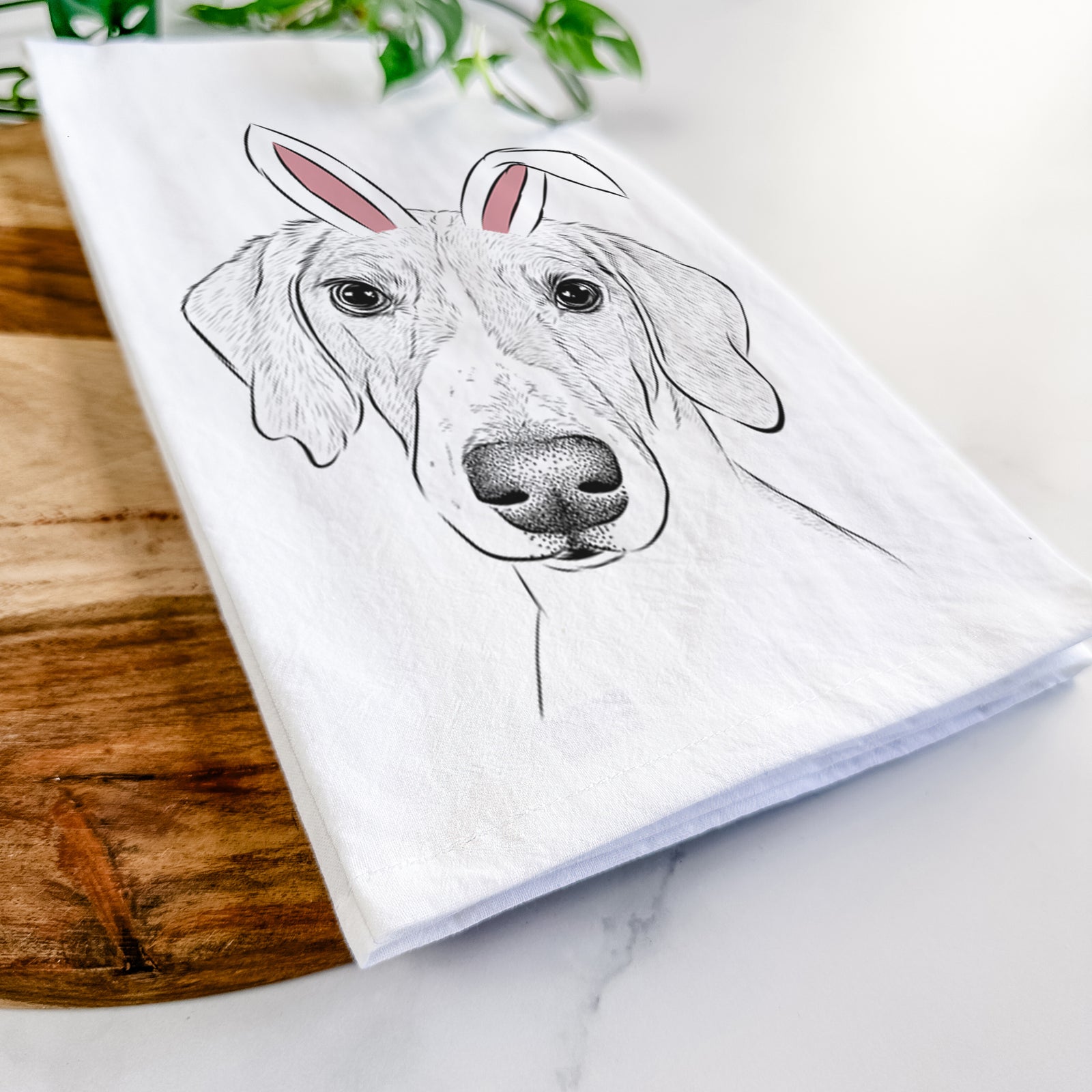 Hand-drawn sketch of Stanley the Foxhound wearing Easter bunny ears on a tea towel