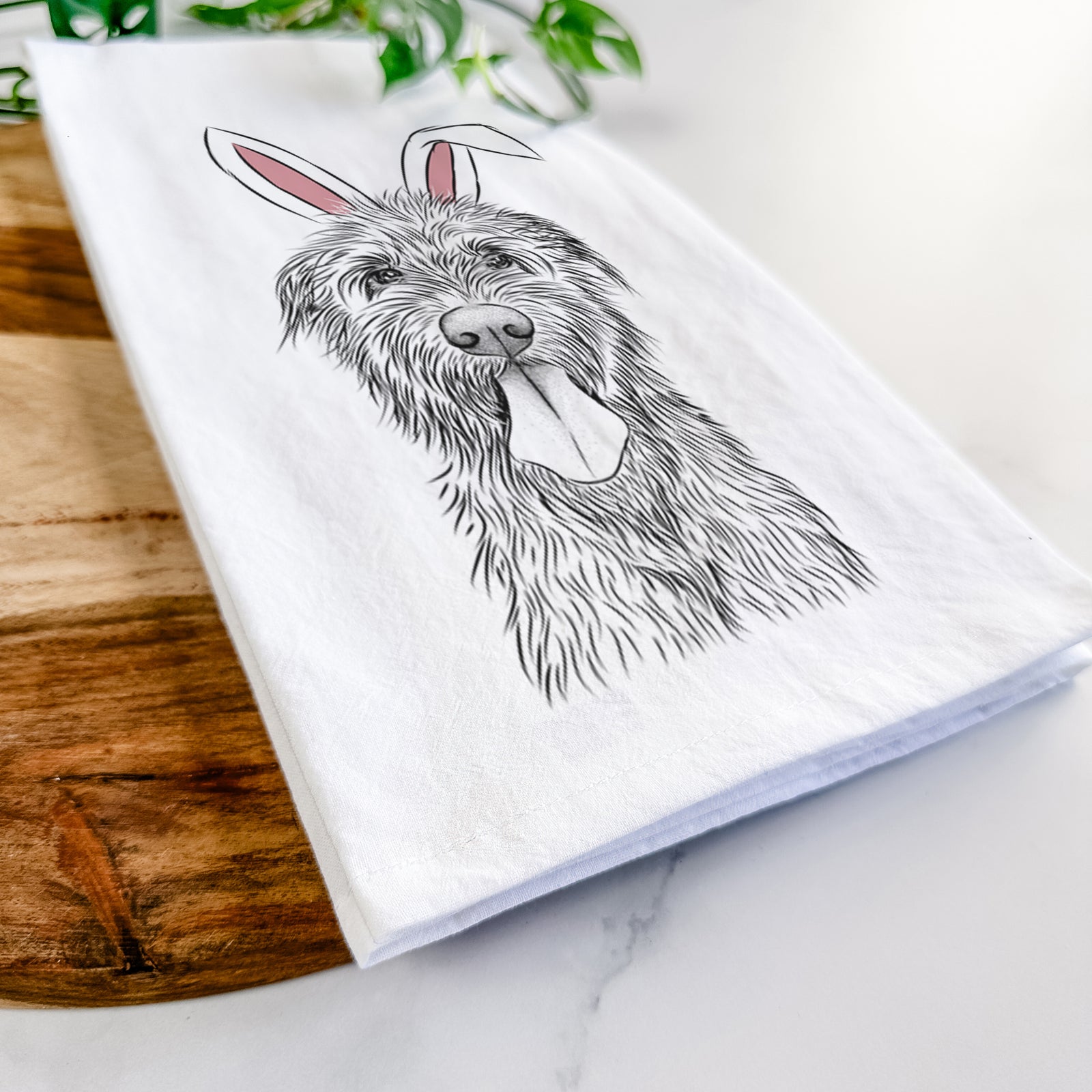Hand-drawn sketch of Sullivan the Irish Wolfhound wearing Easter bunny ears on a tea towel