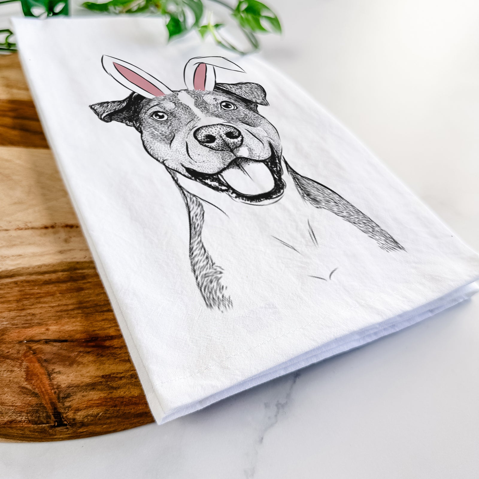Hand-drawn sketch of Wendy the Mixed Breed wearing Easter bunny ears on a tea towel