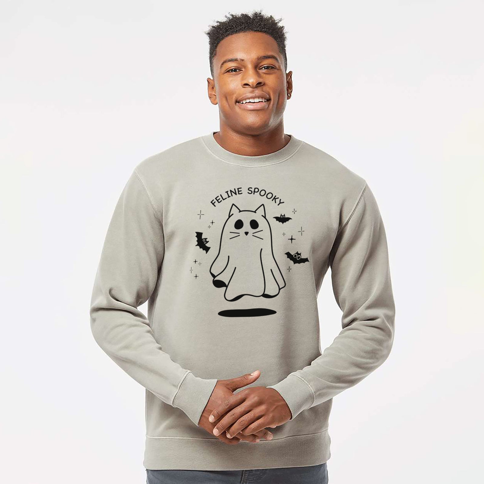 'Feline Spooky' design on a Cement Unisex pigment dyed crew sweatshirt