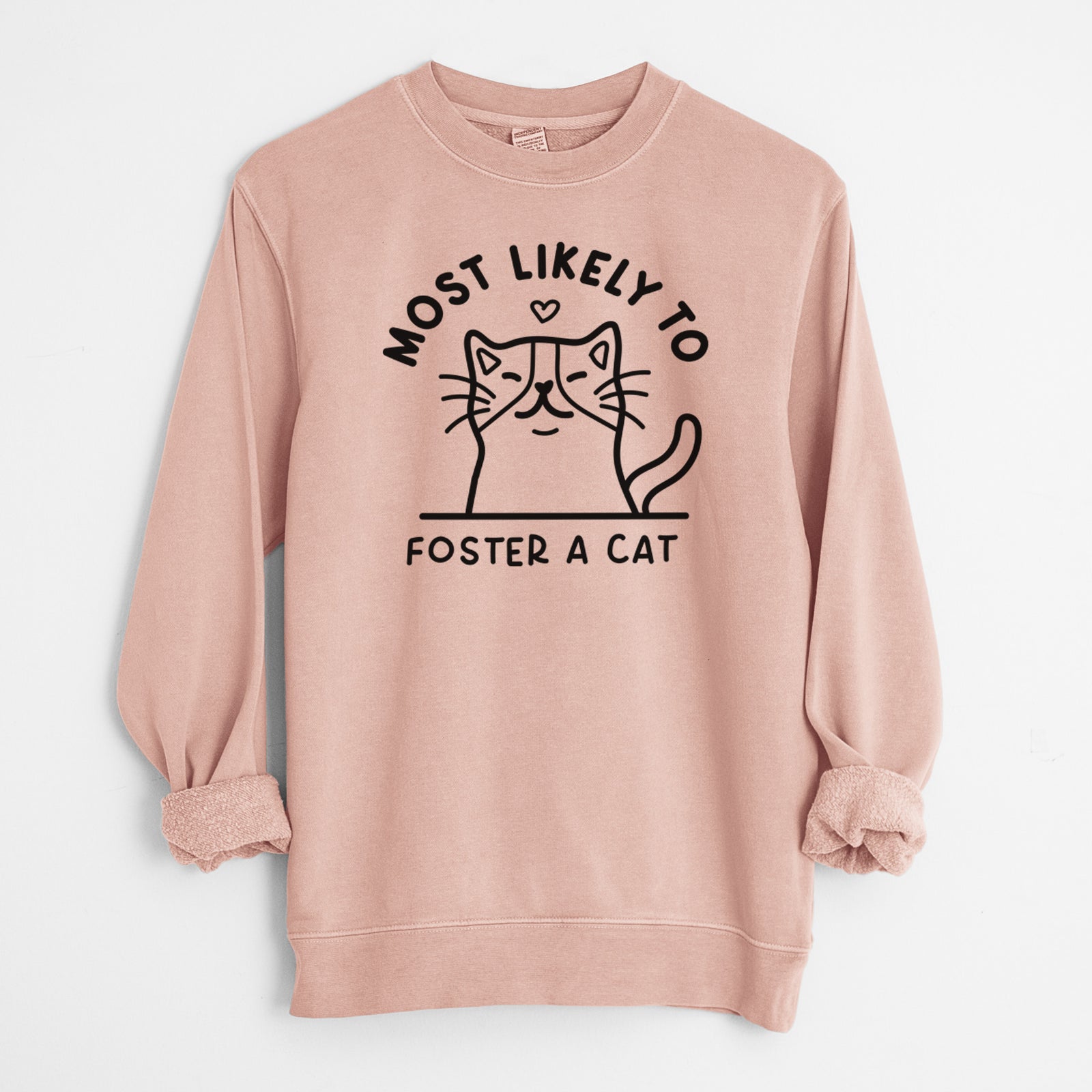 'Most Likely to Foster a Cat' design on a Dusty Pink Unisex pigment dyed crew sweatshirt