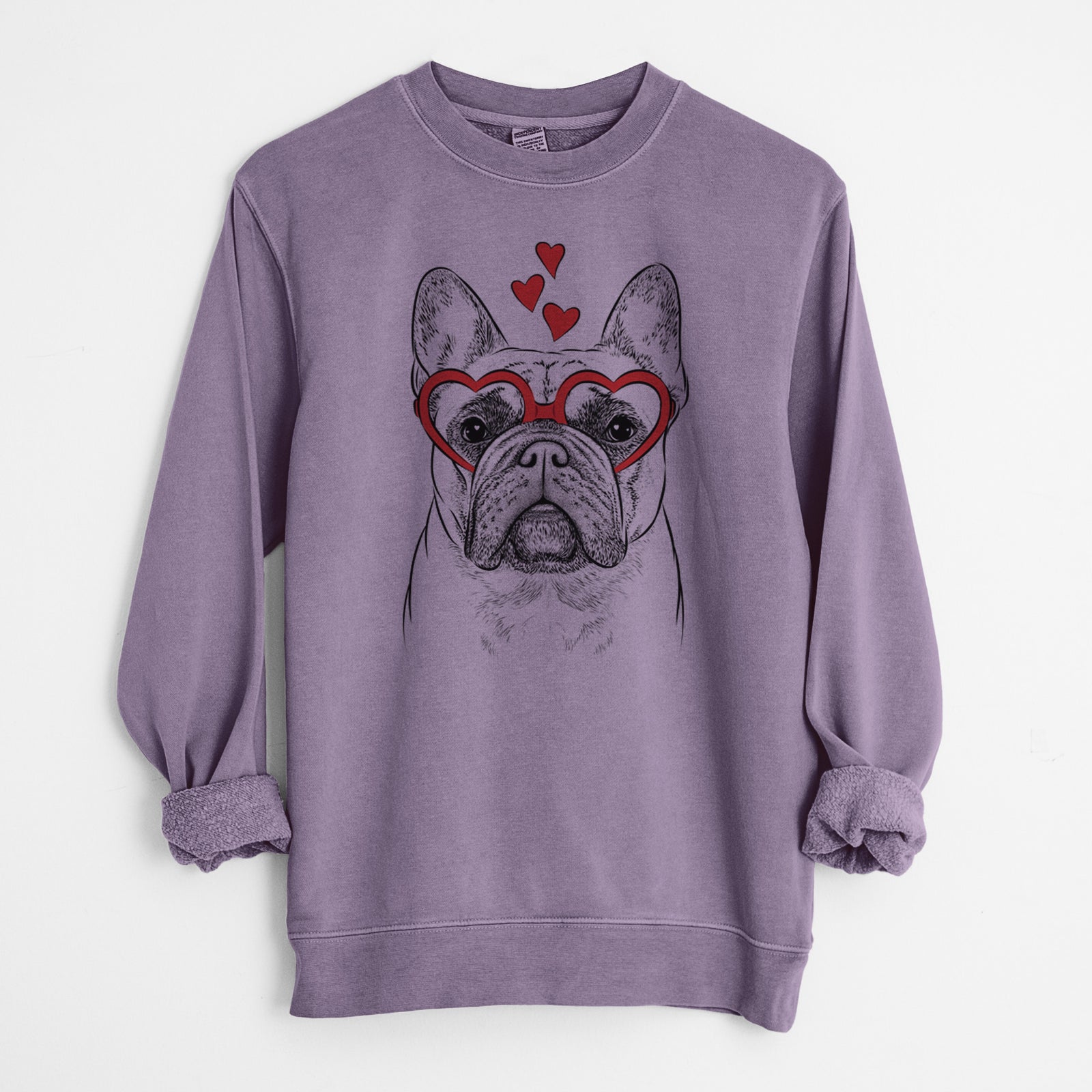 Hand-drawn sketch of Acelynn the French Bulldog wearing heart-shaped glasses on a Plum Unisex pigment dyed crew sweatshirt