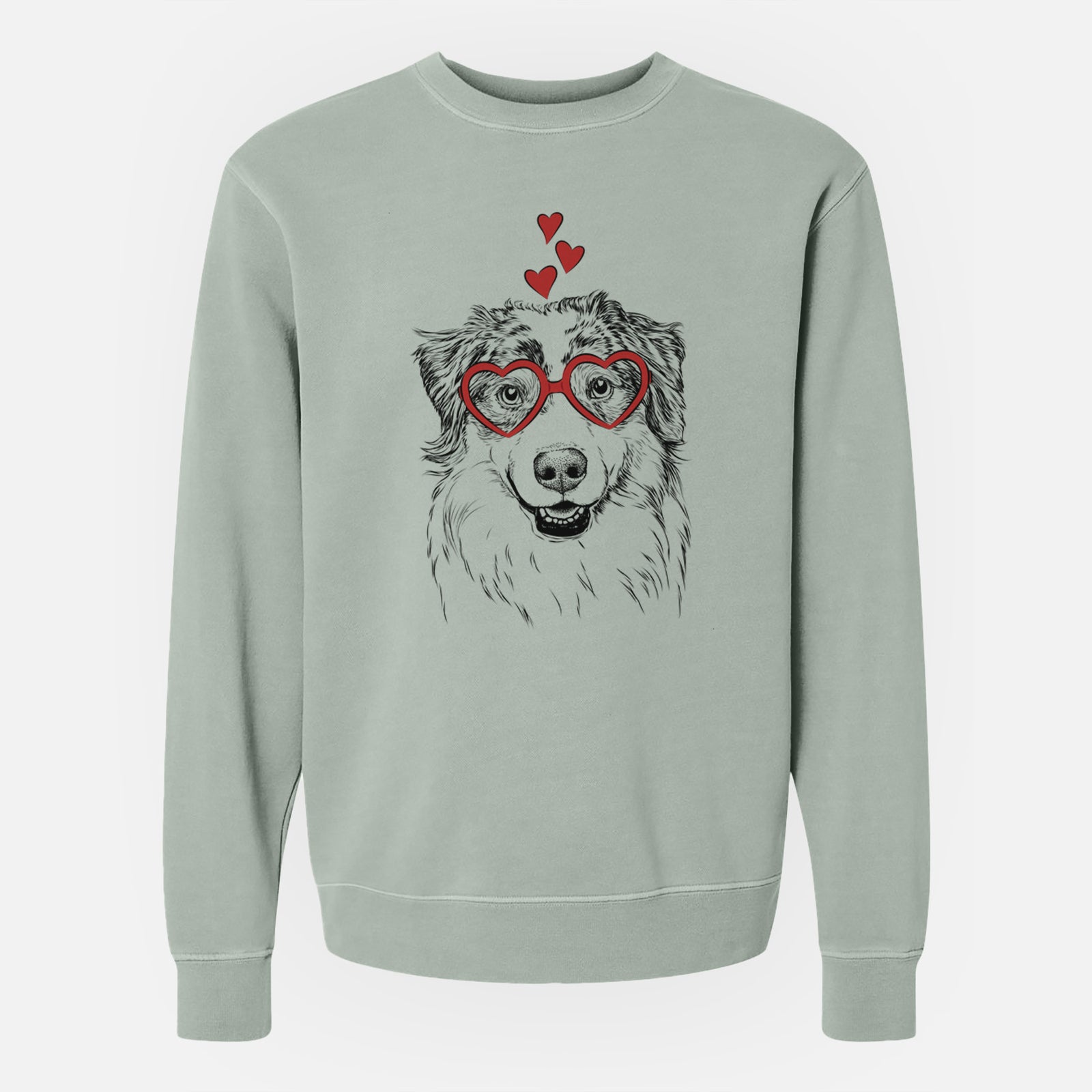 Hand-drawn sketch of Aonghus the Australian Shepherd wearing heart-shaped glasses on a Sage Unisex pigment dyed crew sweatshirt