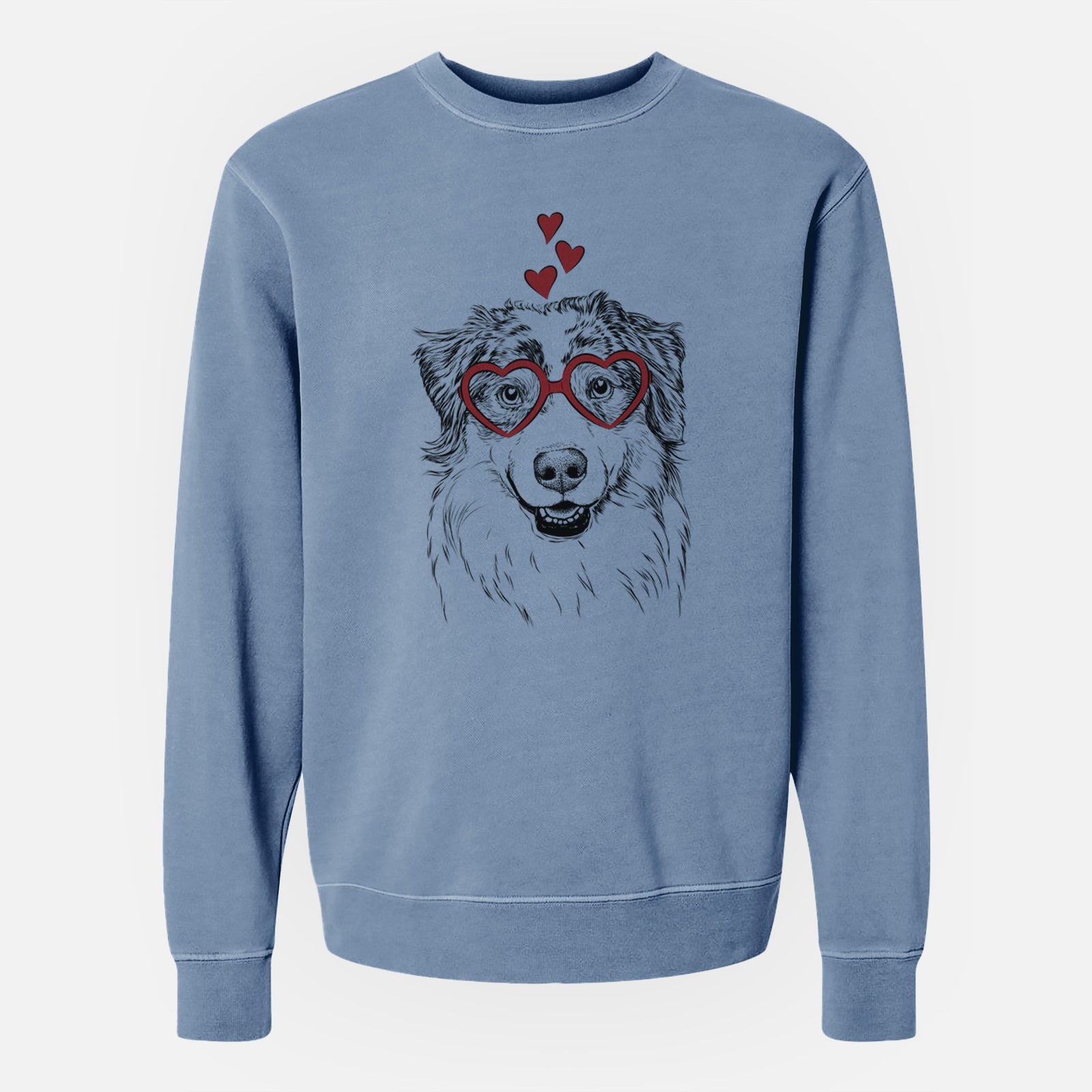 Hand-drawn sketch of Aonghus the Australian Shepherd wearing heart-shaped glasses on a Slate Blue Unisex pigment dyed crew sweatshirt