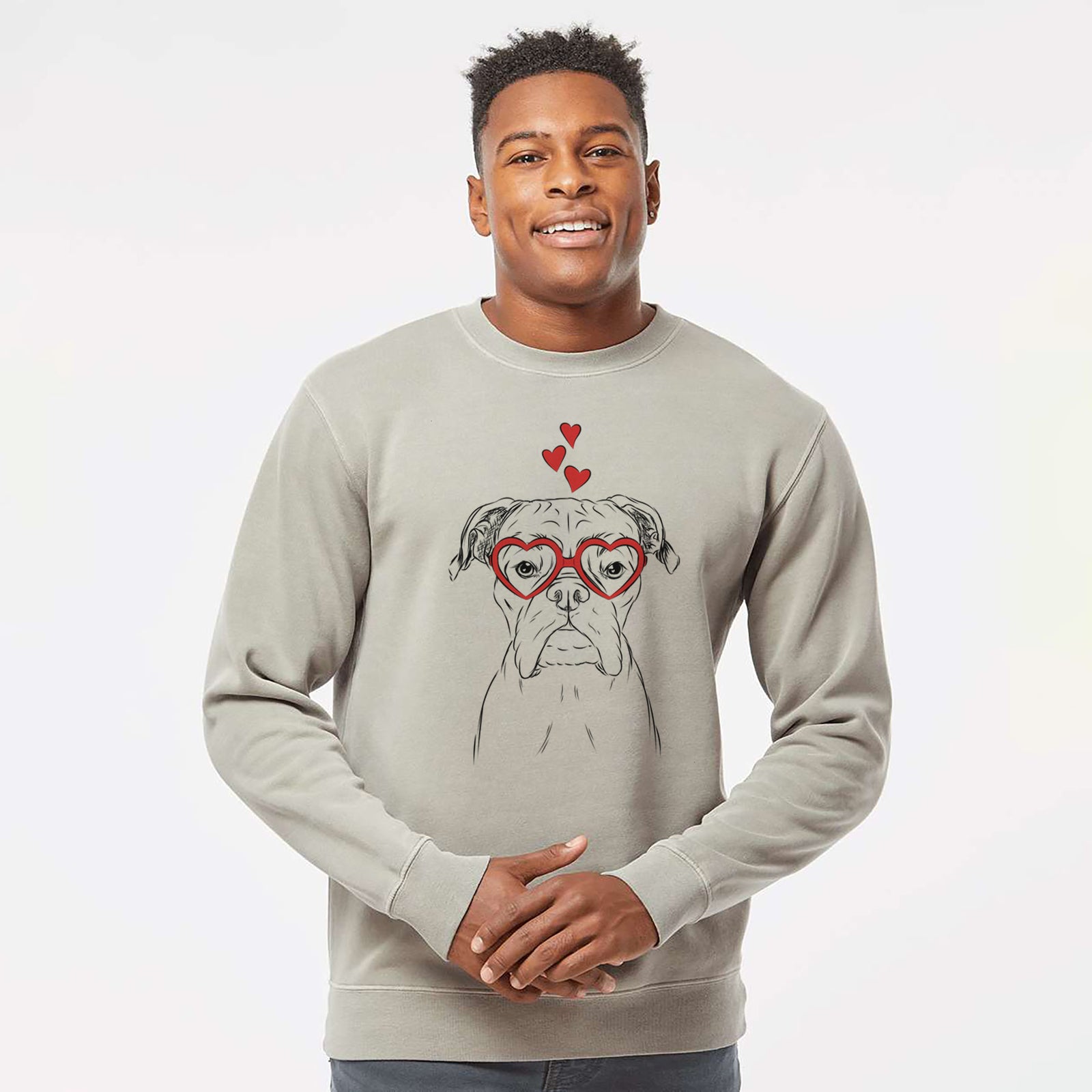 Hand-drawn sketch of Axel the Boxer wearing heart-shaped glasses on a Cement Unisex pigment dyed crew sweatshirt