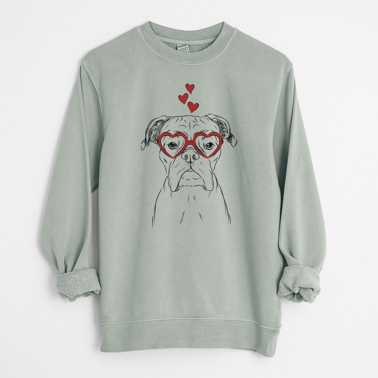 Hand-drawn sketch of Axel the Boxer wearing heart-shaped glasses on a Sage Unisex pigment dyed crew sweatshirt