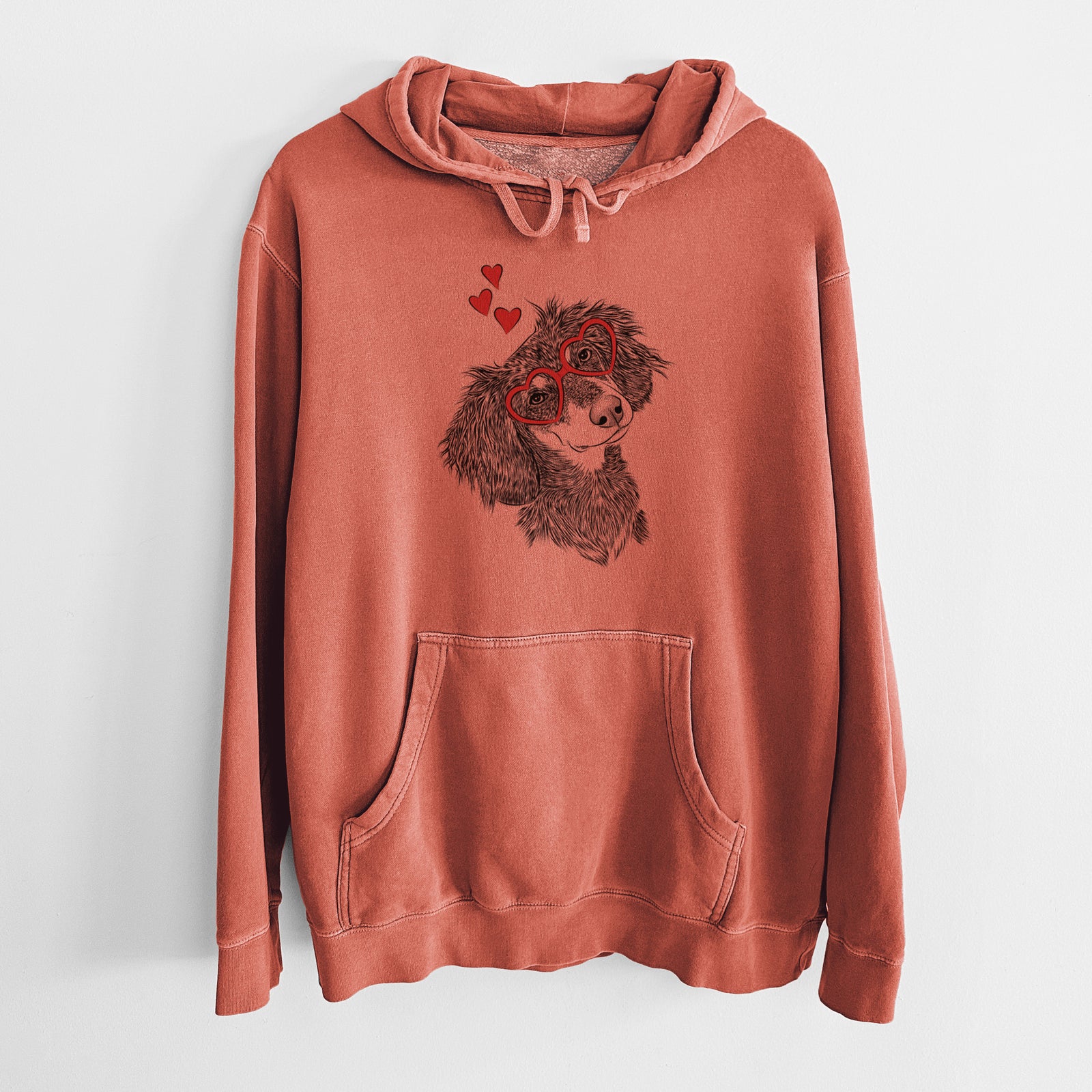 Hand-drawn sketch of Bailey the Long Haired Dachshund wearing heart-shaped glasses on an Amber Unisex pigment dyed hoodie