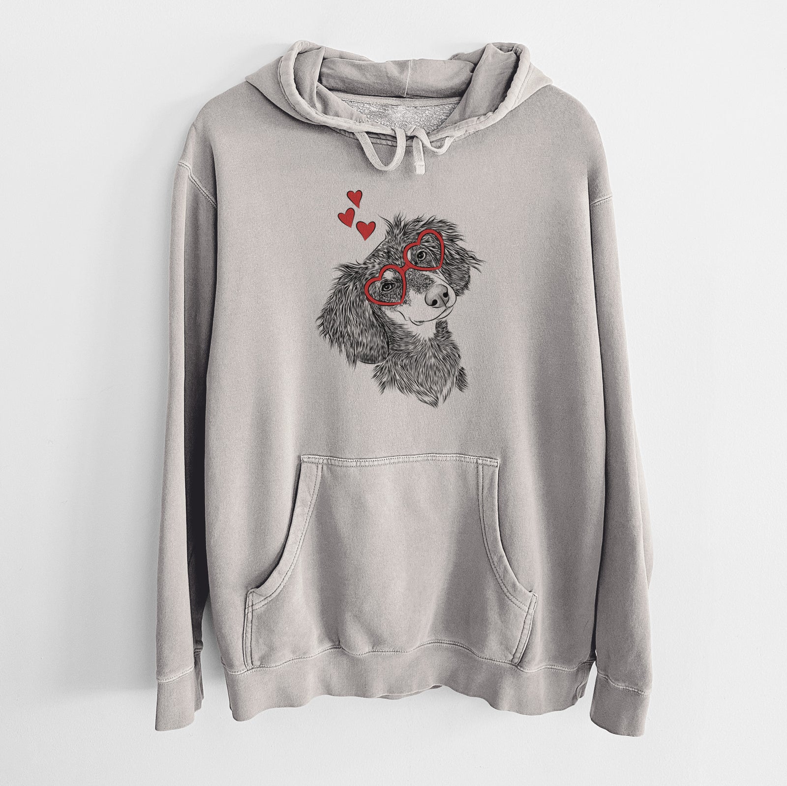 Hand-drawn sketch of Bailey the Long Haired Dachshund wearing heart-shaped glasses on a Cement Unisex pigment dyed hoodie