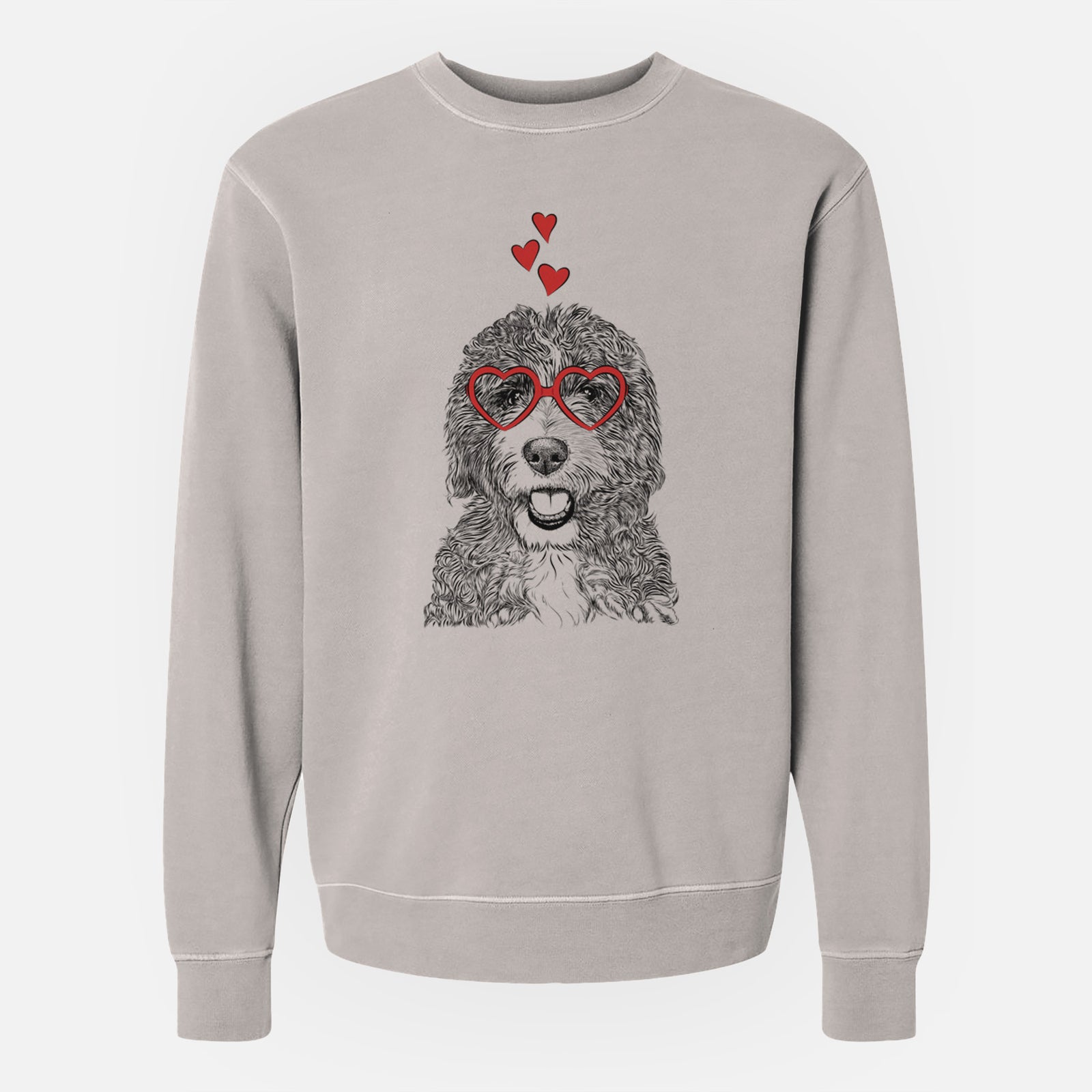 Hand-drawn sketch of Bash the Bernedoodle wearing heart-shaped glasses on a Cement Unisex pigment dyed crew sweatshirt