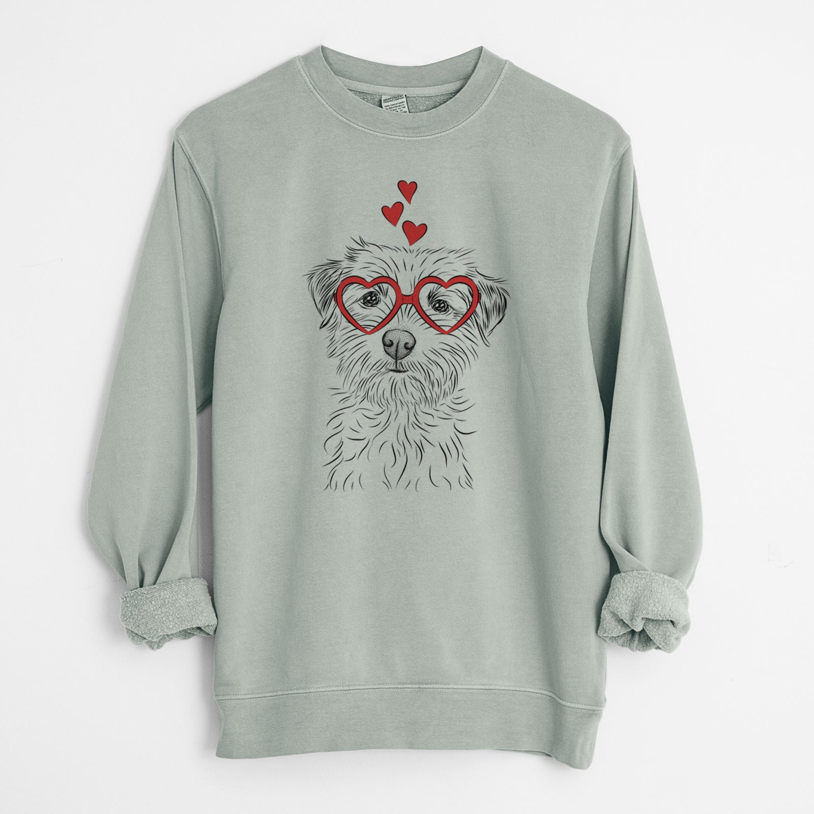Hand-drawn sketch of Benjamin the Border Terrier wearing heart-shaped glasses on a Sage Unisex pigment dyed crew sweatshirt