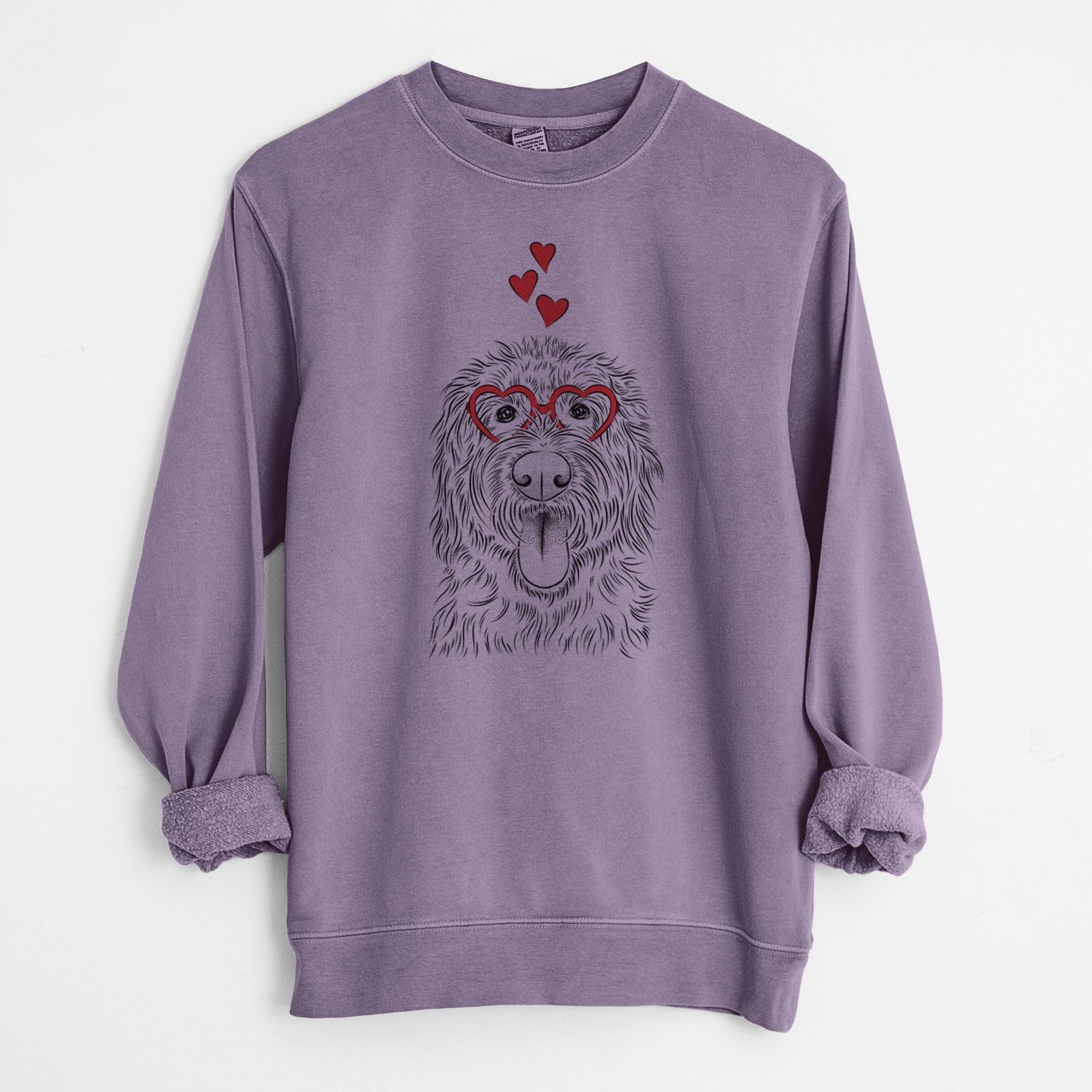 Hand-drawn sketch of Bennett the Doodle wearing heart-shaped glasses on a Plum Unisex pigment dyed crew sweatshirt