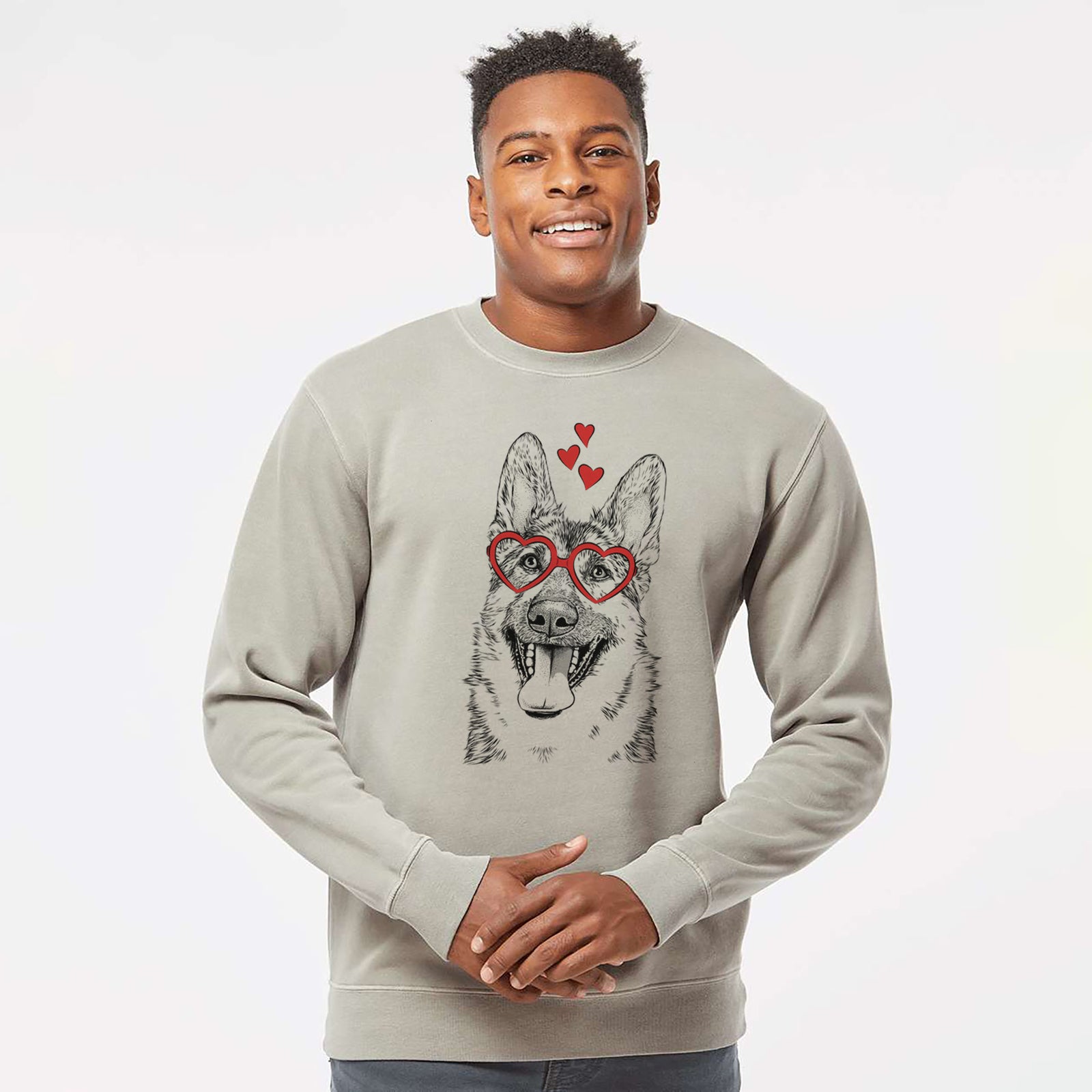 Hand-drawn sketch of Benson the German Shepherd wearing heart-shaped glasses on a Cement Unisex pigment dyed crew sweatshirt
