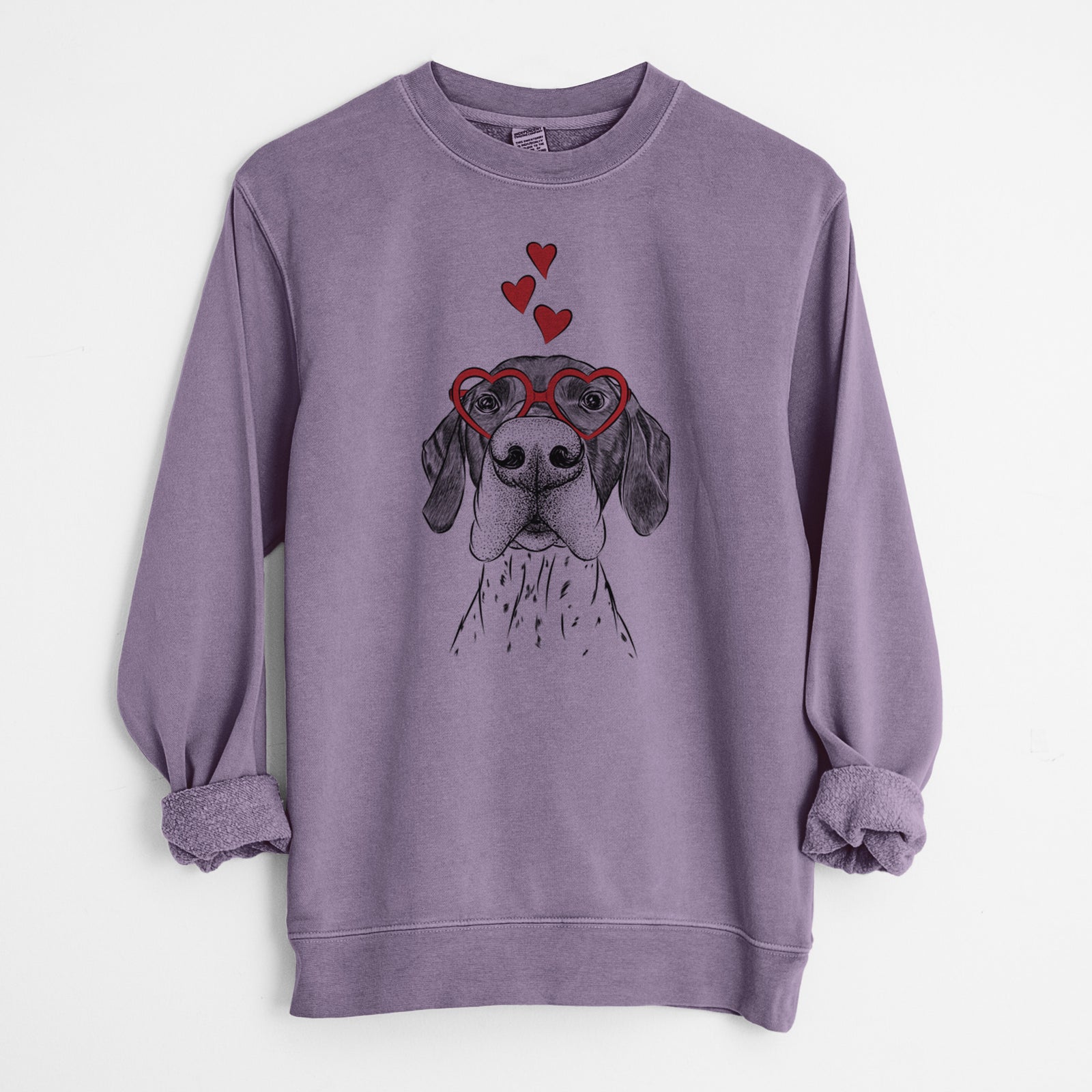 Hand-drawn sketch of Booze the German Shorthaired Pointer wearing heart-shaped glasses on a Plum Unisex pigment dyed crew sweatshirt