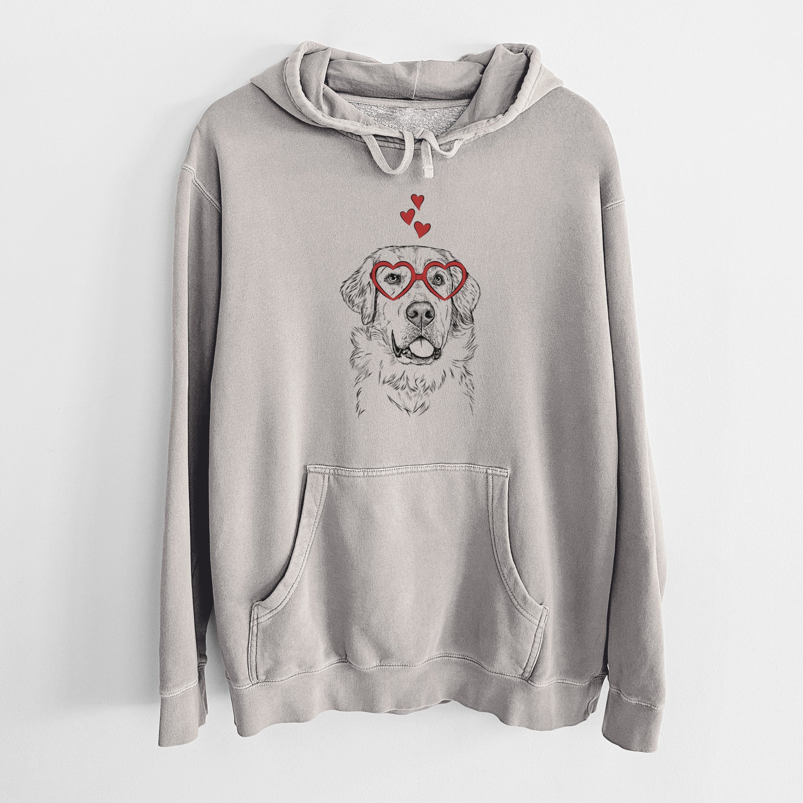 Hand-drawn sketch of Brophy the Great Pyrenees wearing heart-shaped glasses on a Cement Unisex pigment dyed hoodie