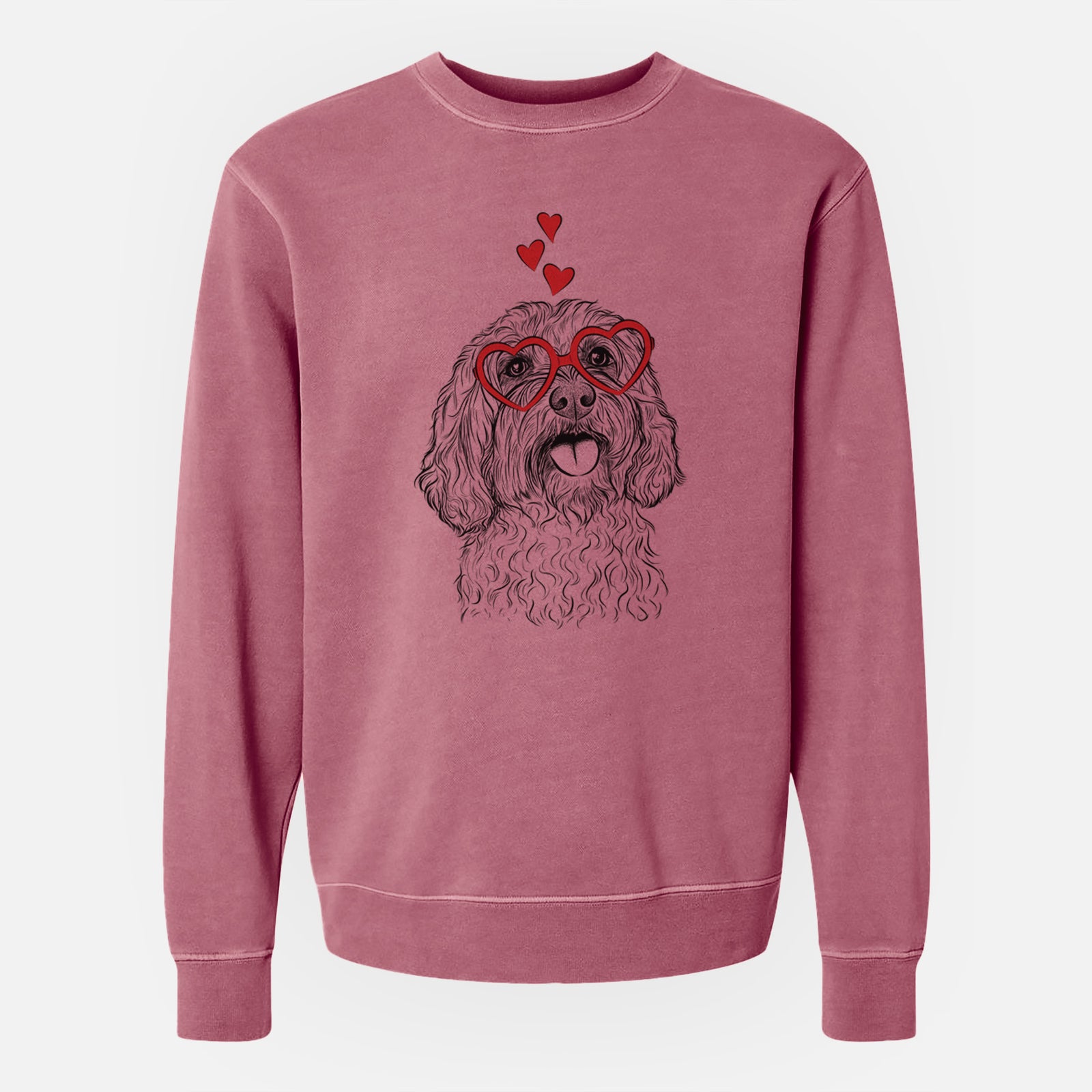 Hand-drawn sketch of Cali the Cavapoo wearing heart-shaped glasses on a Maroon Unisex pigment dyed crew sweatshirt