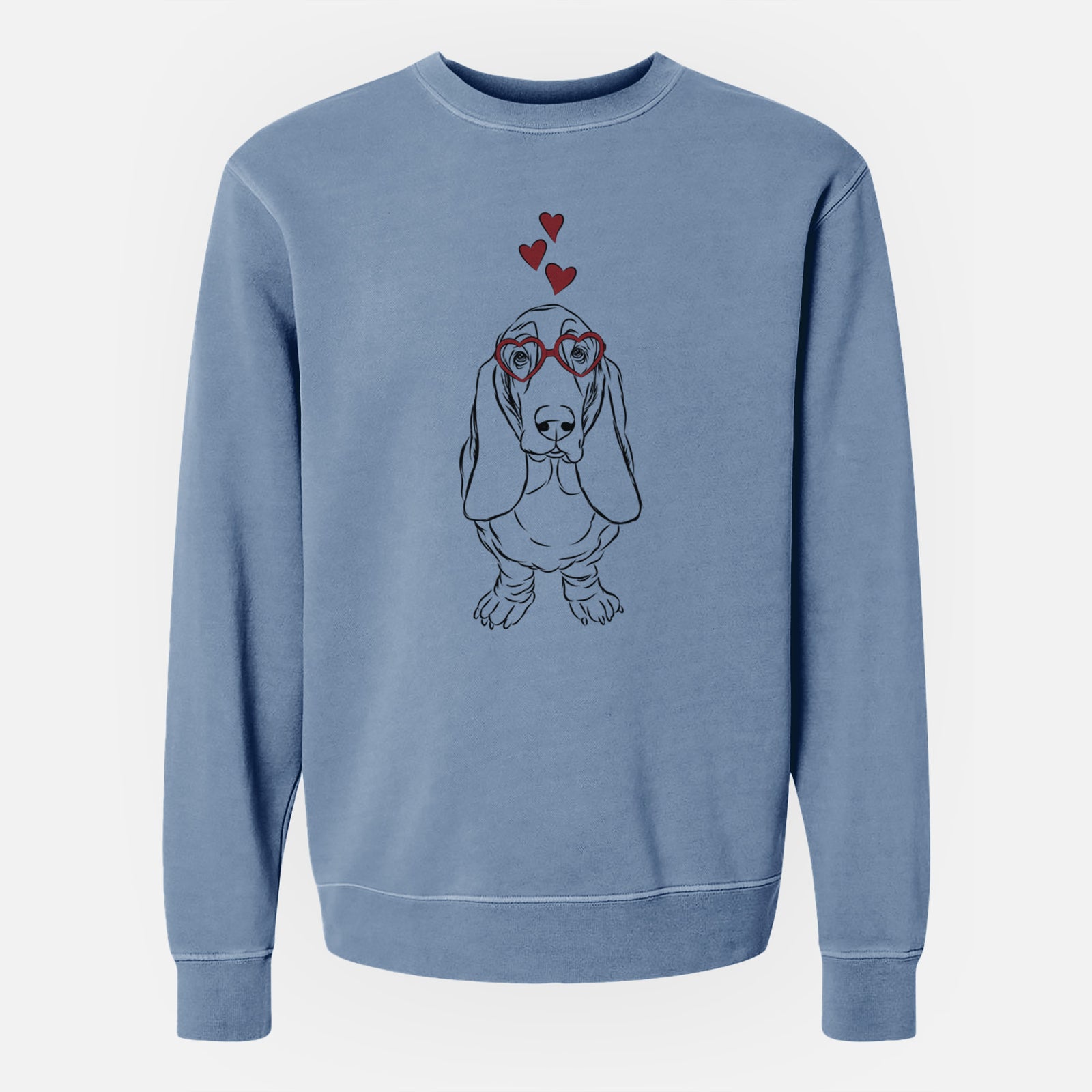 Hand-drawn sketch of Charlie the Basset Hound wearing heart-shaped glasses on a Slate Blue Unisex pigment dyed crew sweatshirt