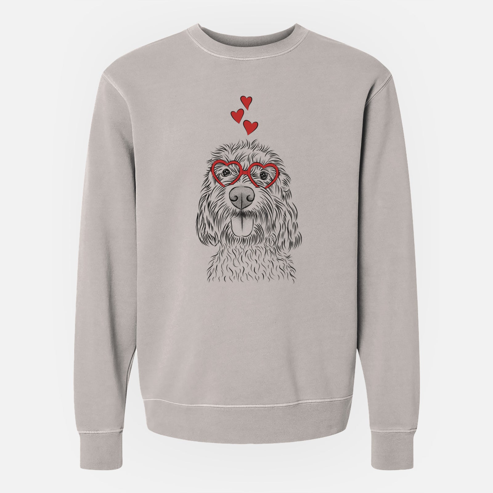 Hand-drawn sketch of Clover the Cockapoo wearing heart-shaped glasses on a Cement Unisex pigment dyed crew sweatshirt