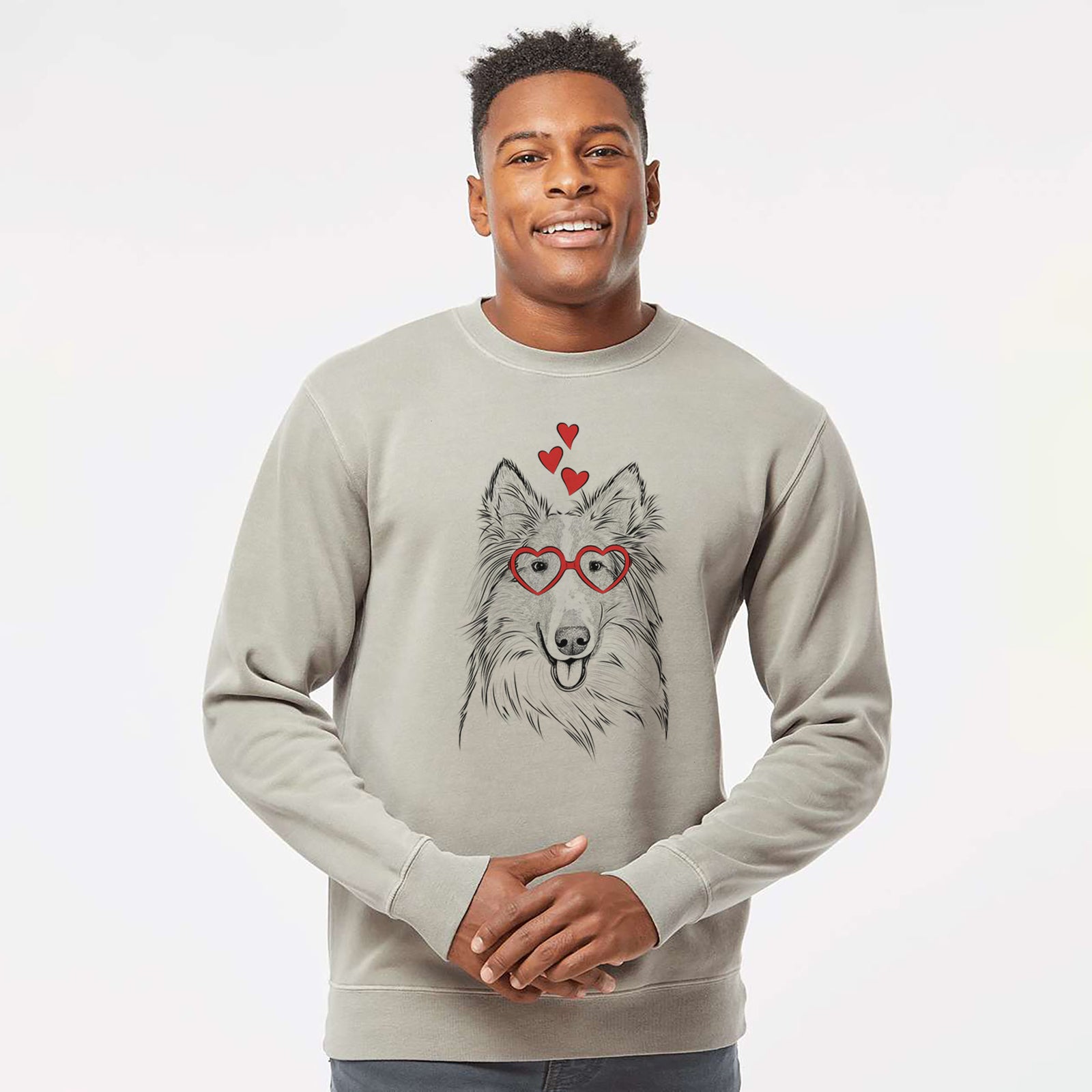 Hand-drawn sketch of Conrad the Rough Collie wearing heart-shaped glasses on a Cement Unisex pigment dyed crew sweatshirt