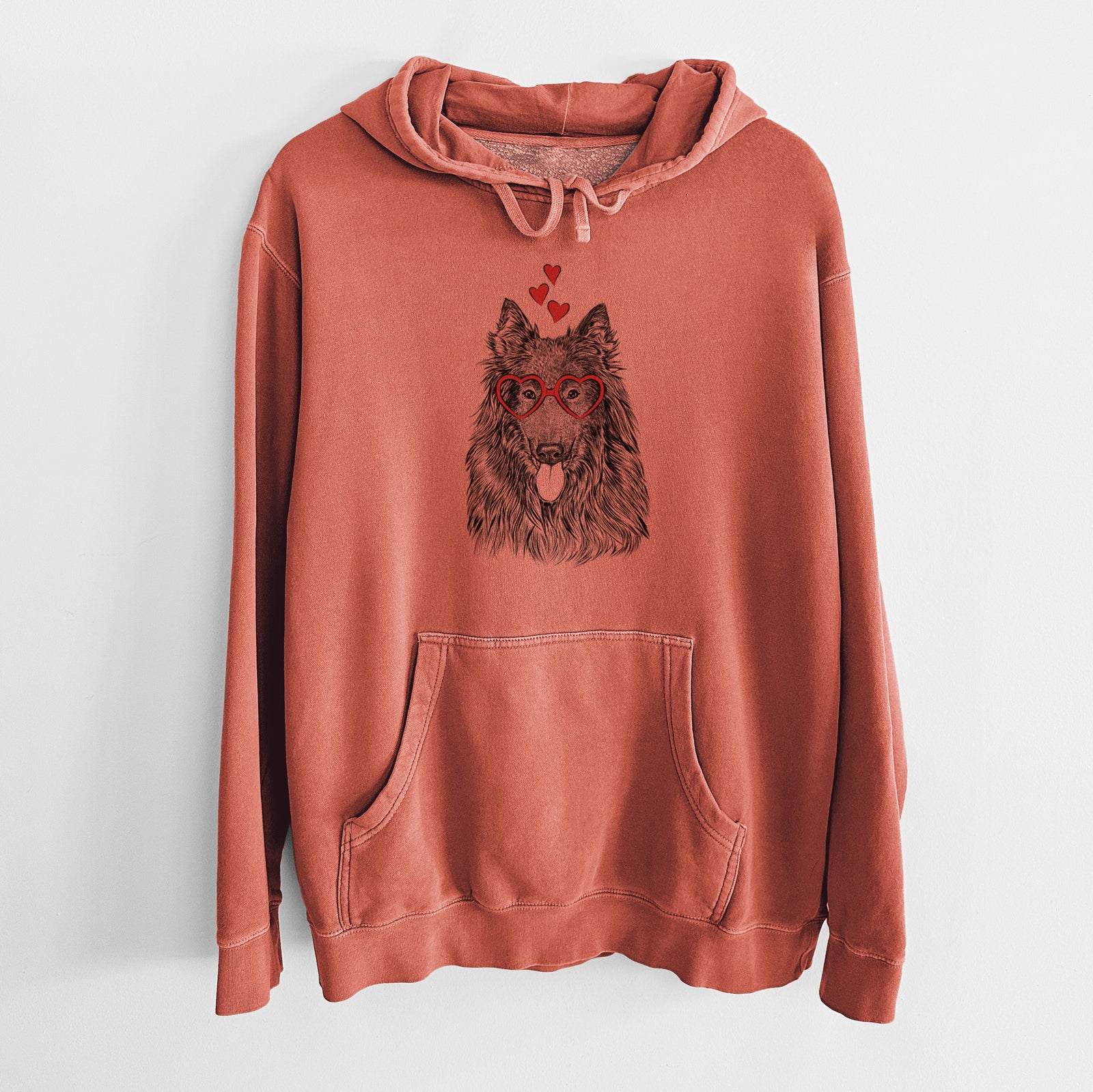 Hand-drawn sketch of Daan the Belgian Shepherd wearing heart-shaped glasses on an Amber Unisex pigment dyed hoodie