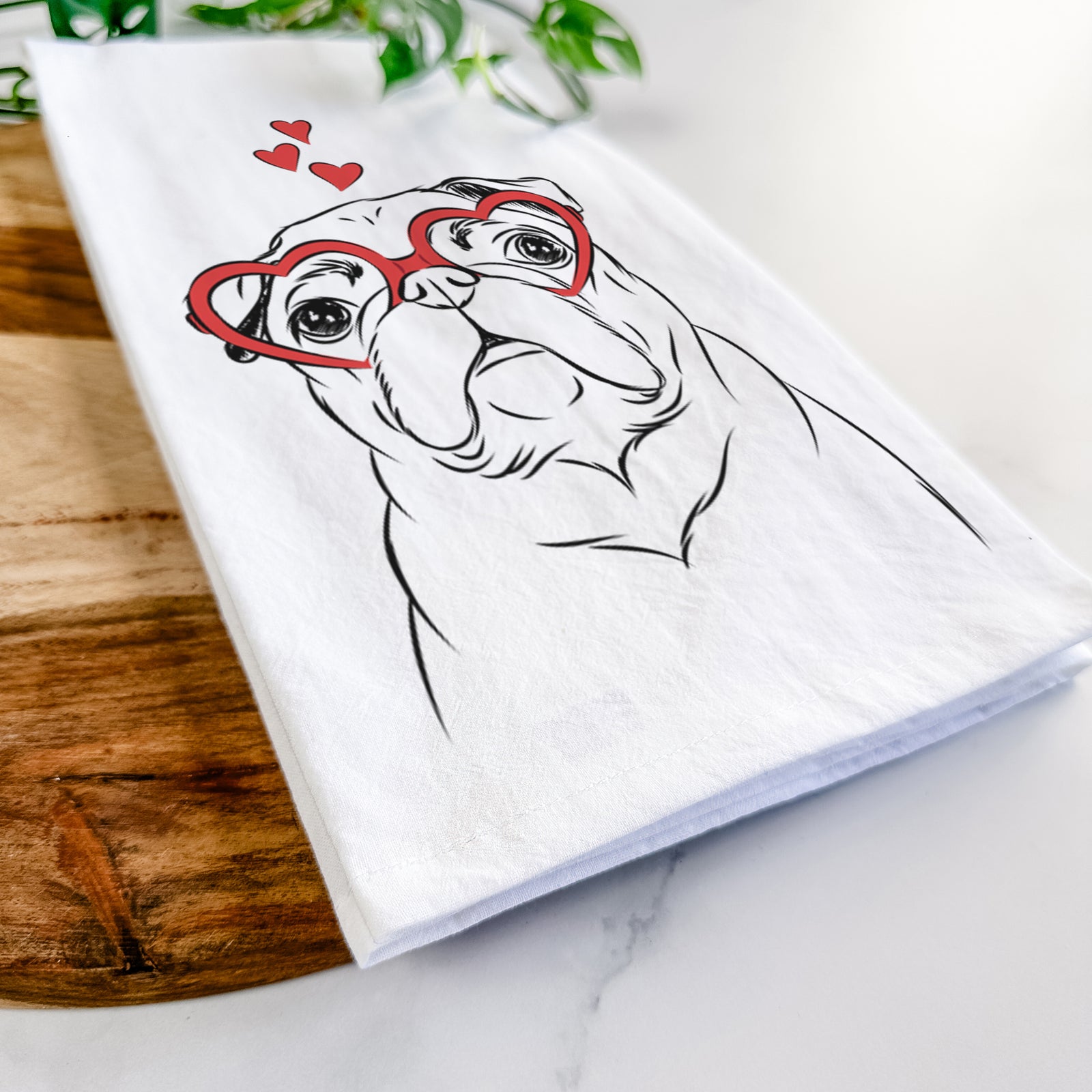 Hand-drawn sketch of Darling Chloe the Pug wearing heart-shaped glasses on a tea towel