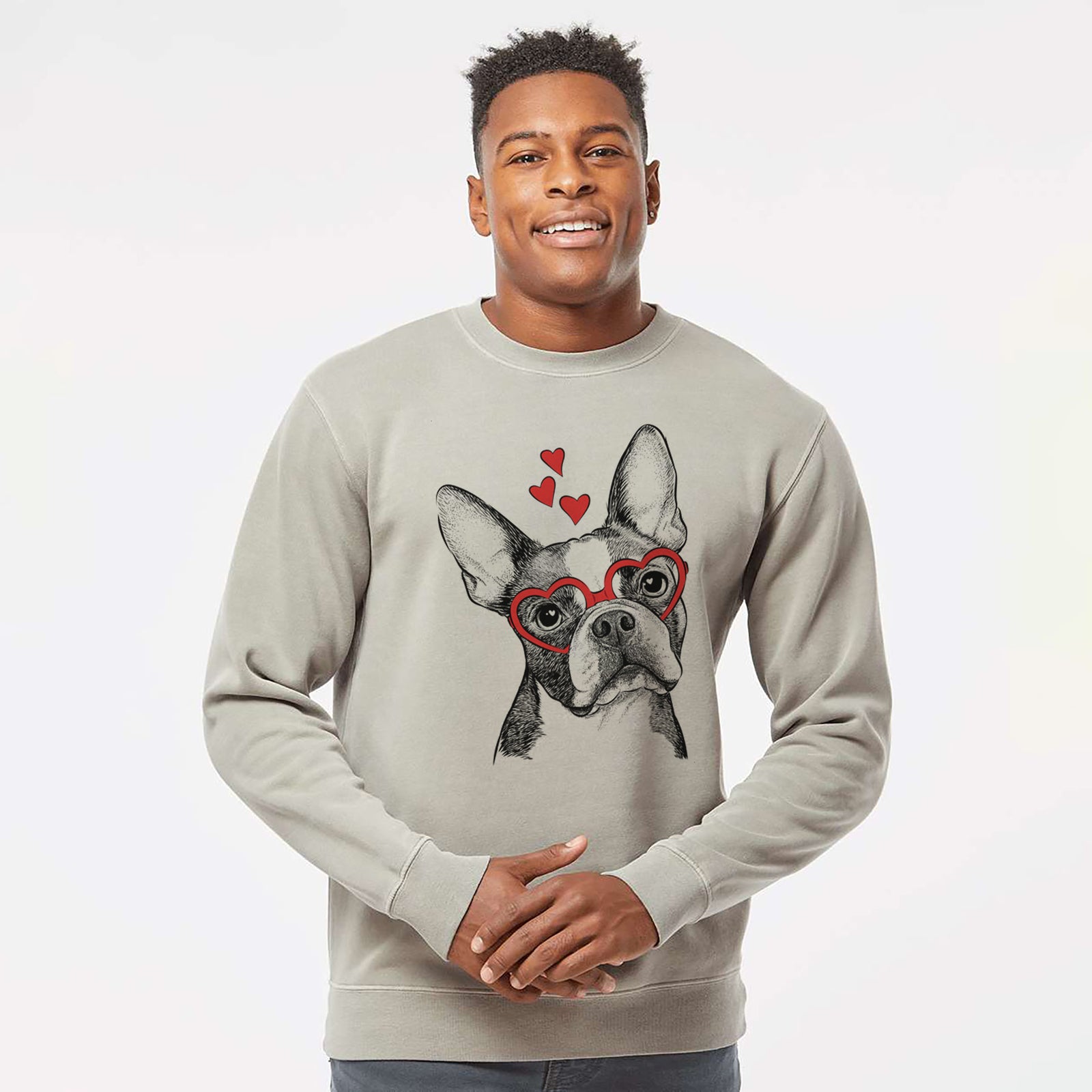 Hand-drawn sketch of Dee Dee the Boston Terrier wearing heart-shaped glasses on a Cement Unisex pigment dyed crew sweatshirt