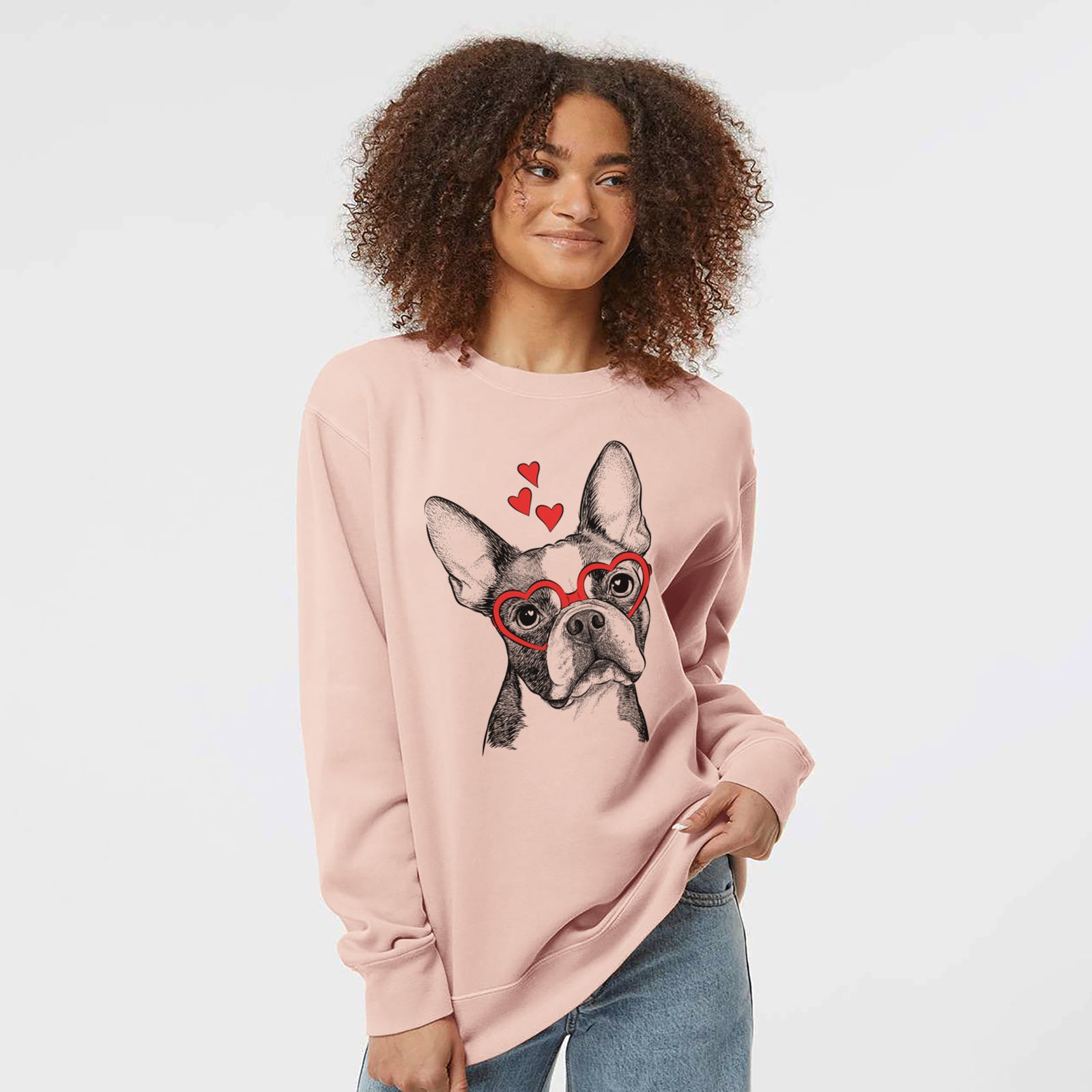 Hand-drawn sketch of Dee Dee the Boston Terrier wearing heart-shaped glasses on a Dusty Pink Unisex pigment dyed crew sweatshirt