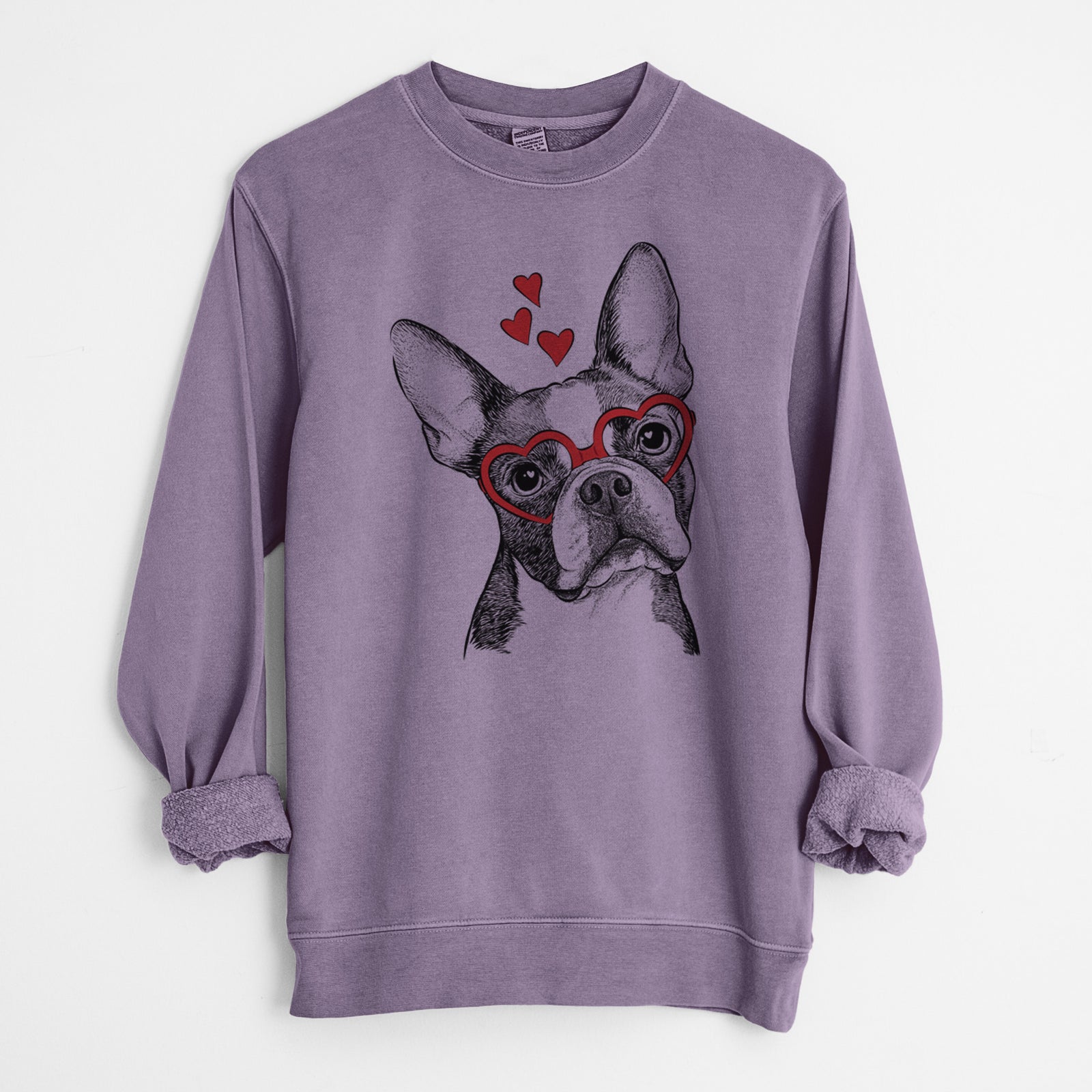 Hand-drawn sketch of Dee Dee the Boston Terrier wearing heart-shaped glasses on a Plum Unisex pigment dyed crew sweatshirt