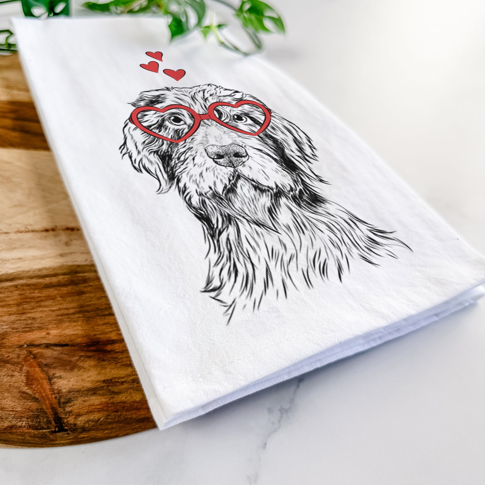 Hand-drawn sketch of Doc Holliday the Pudelpointer wearing heart-shaped glasses on a tea towel