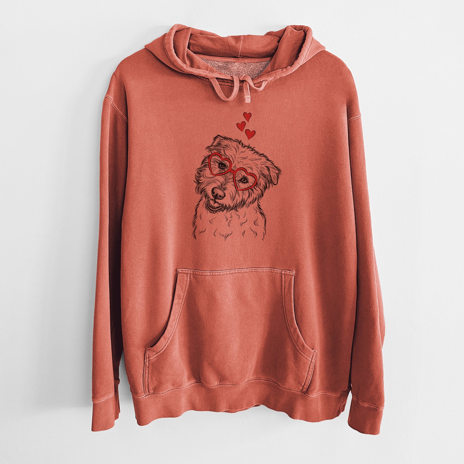 Hand-drawn sketch of Duffy the Glen of Imaal Terrier wearing heart-shaped glasses on an Amber Unisex pigment dyed hoodie