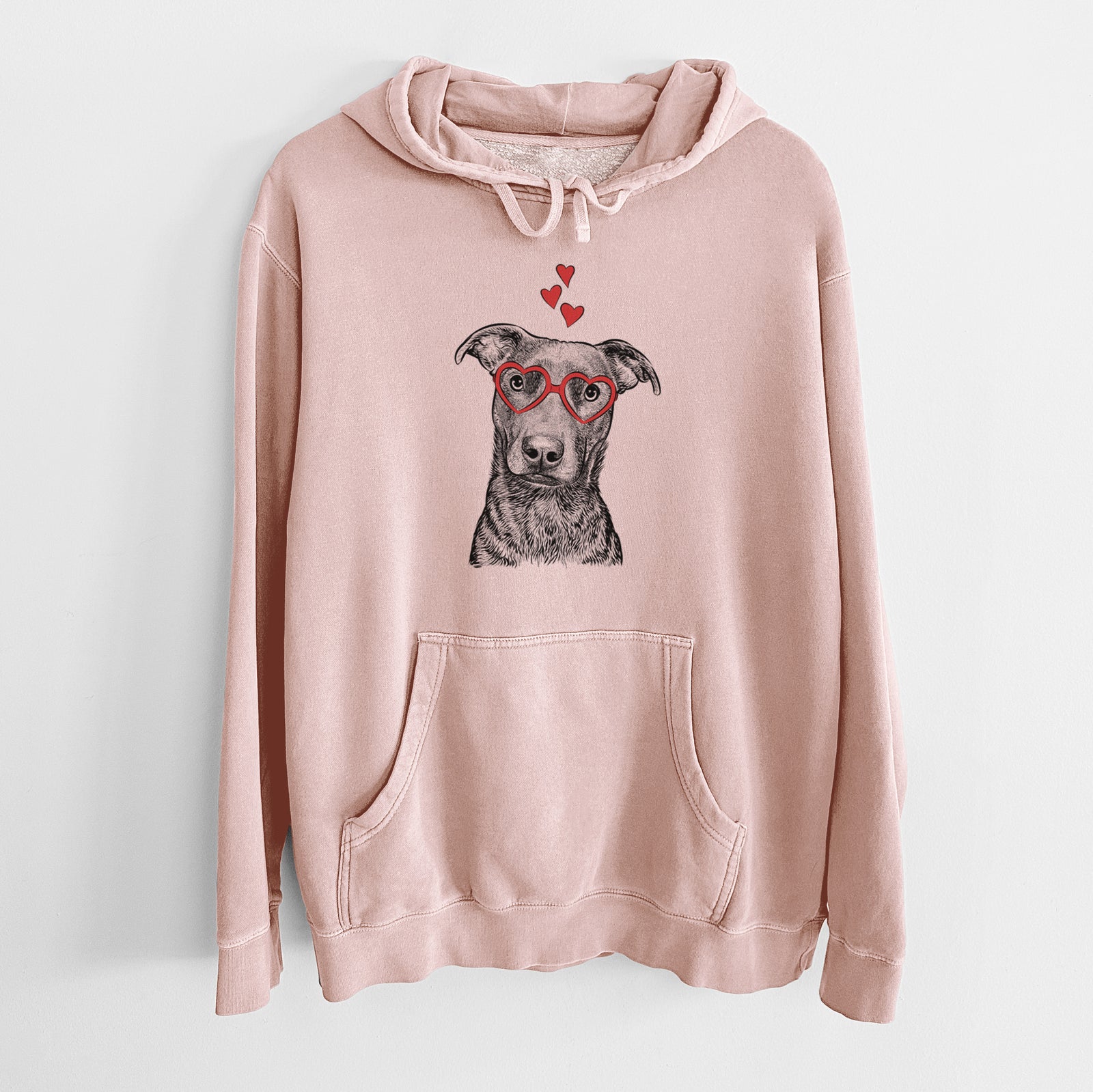 Hand-drawn sketch of Embyr the Mixed Breed wearing heart-shaped glasses on a Dusty Pink Unisex pigment dyed hoodie